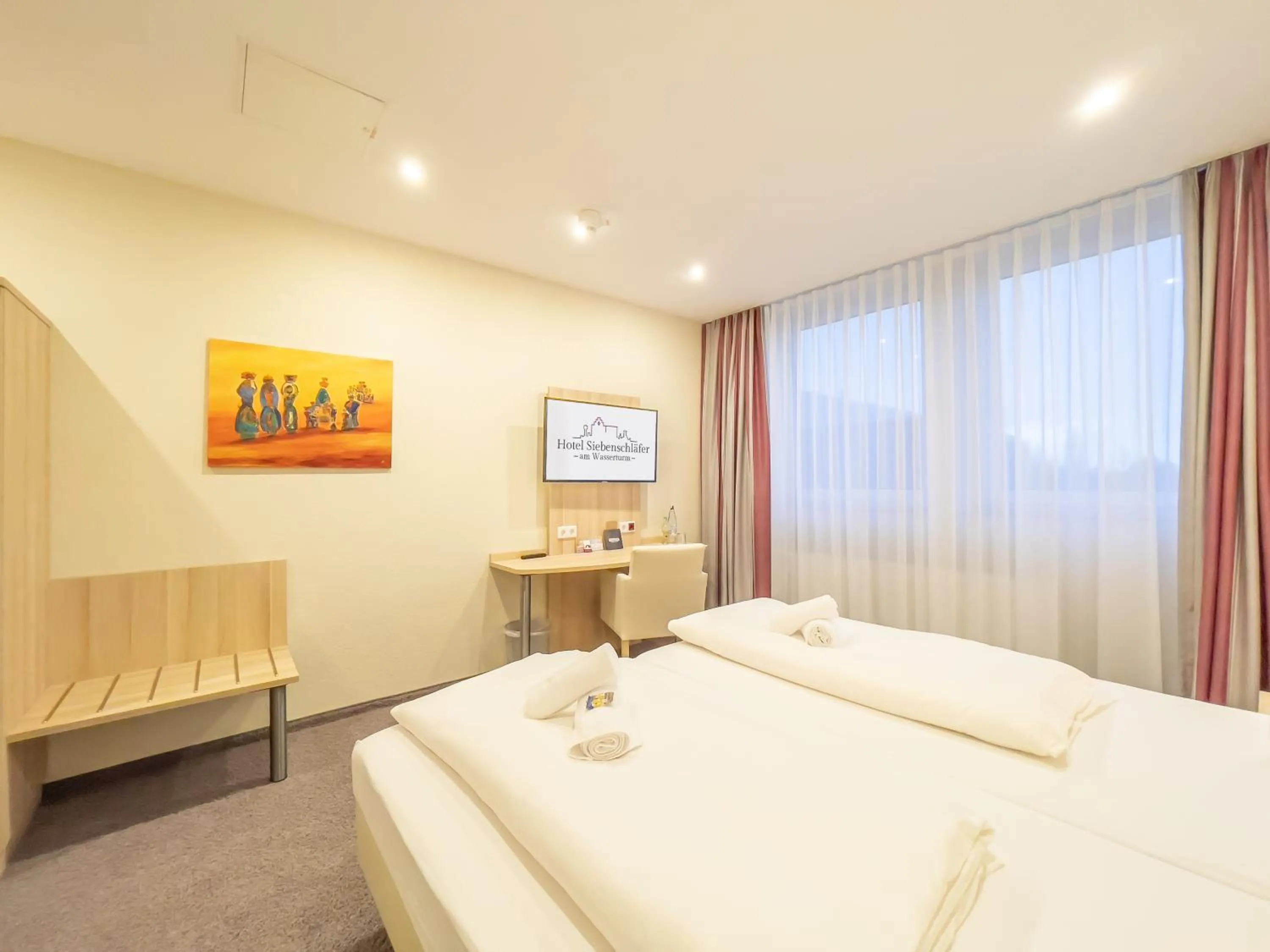 Bed in Hotel Siebenschläfer am Wasserturm