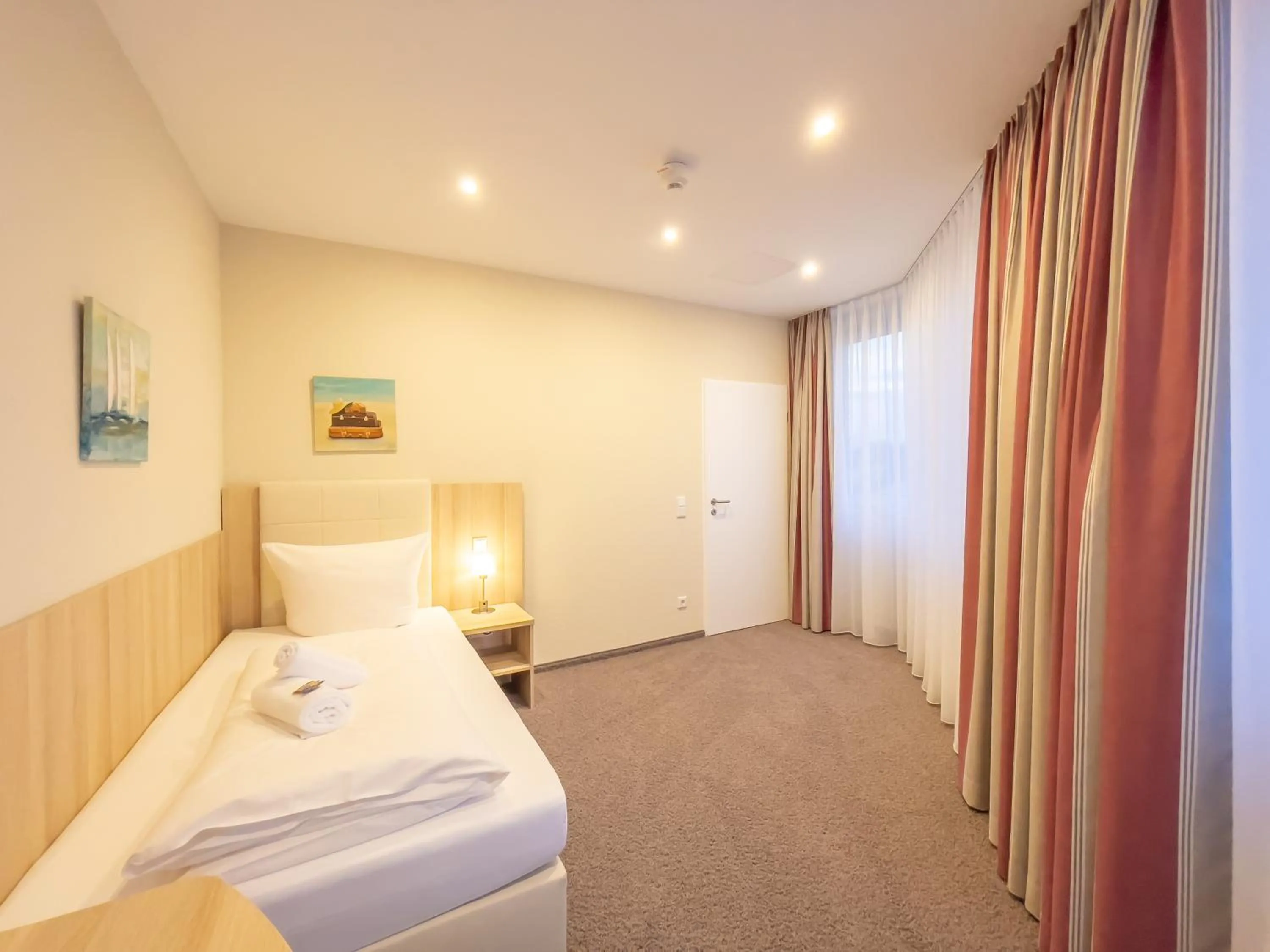 Bed in Hotel Siebenschläfer am Wasserturm