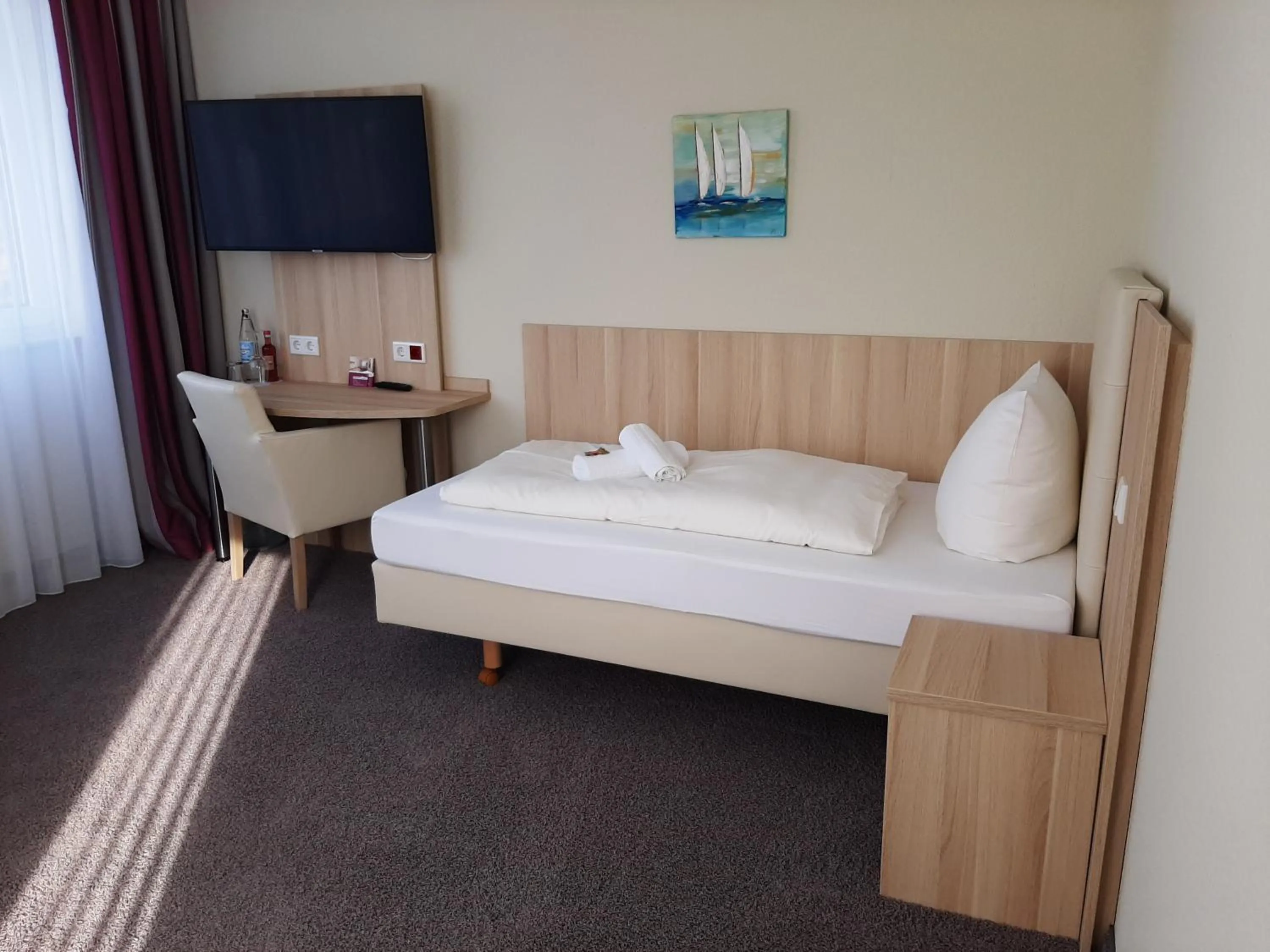 Bed in Hotel Siebenschläfer am Wasserturm