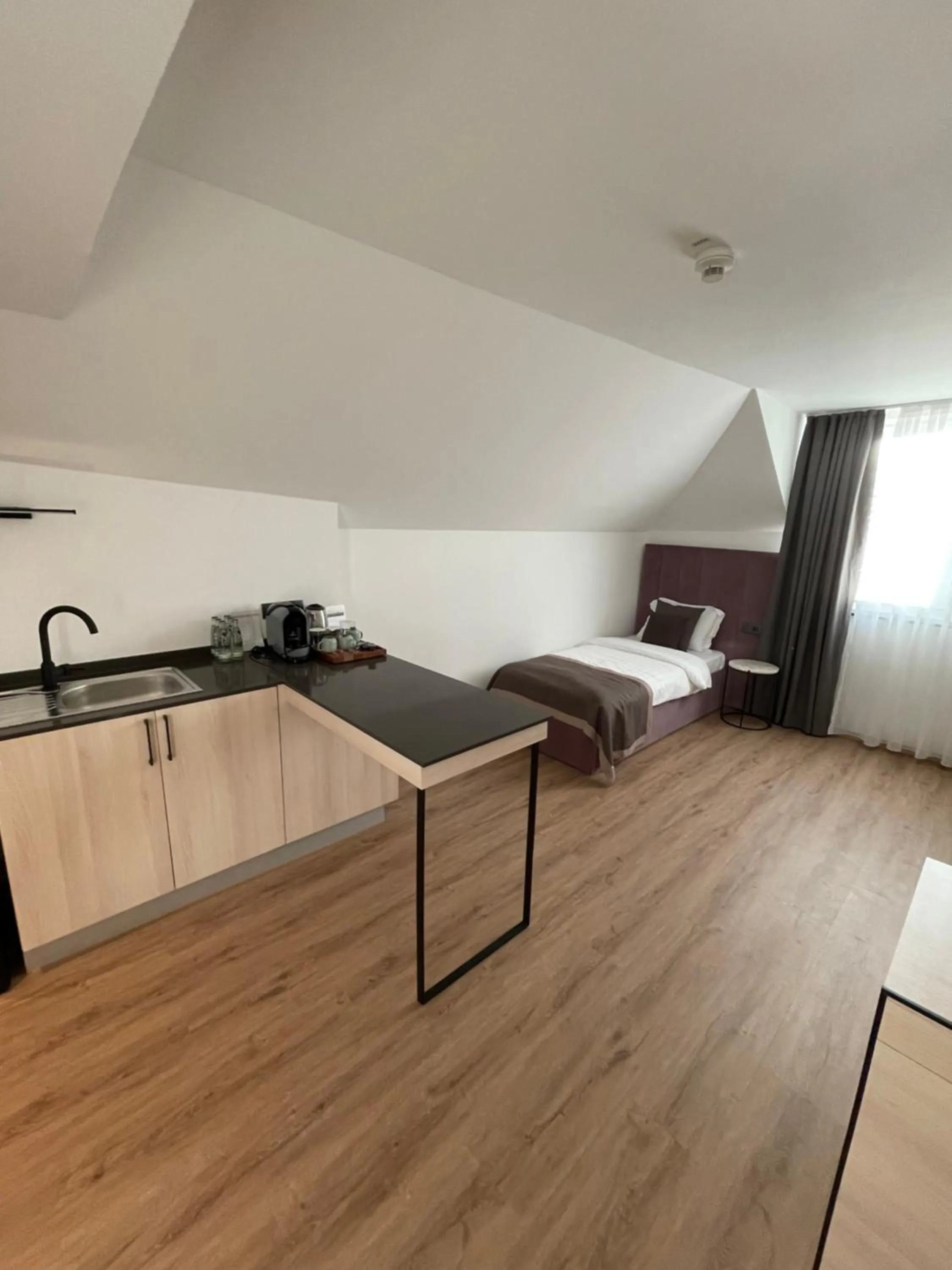 Bed in Bayer's City Hotel