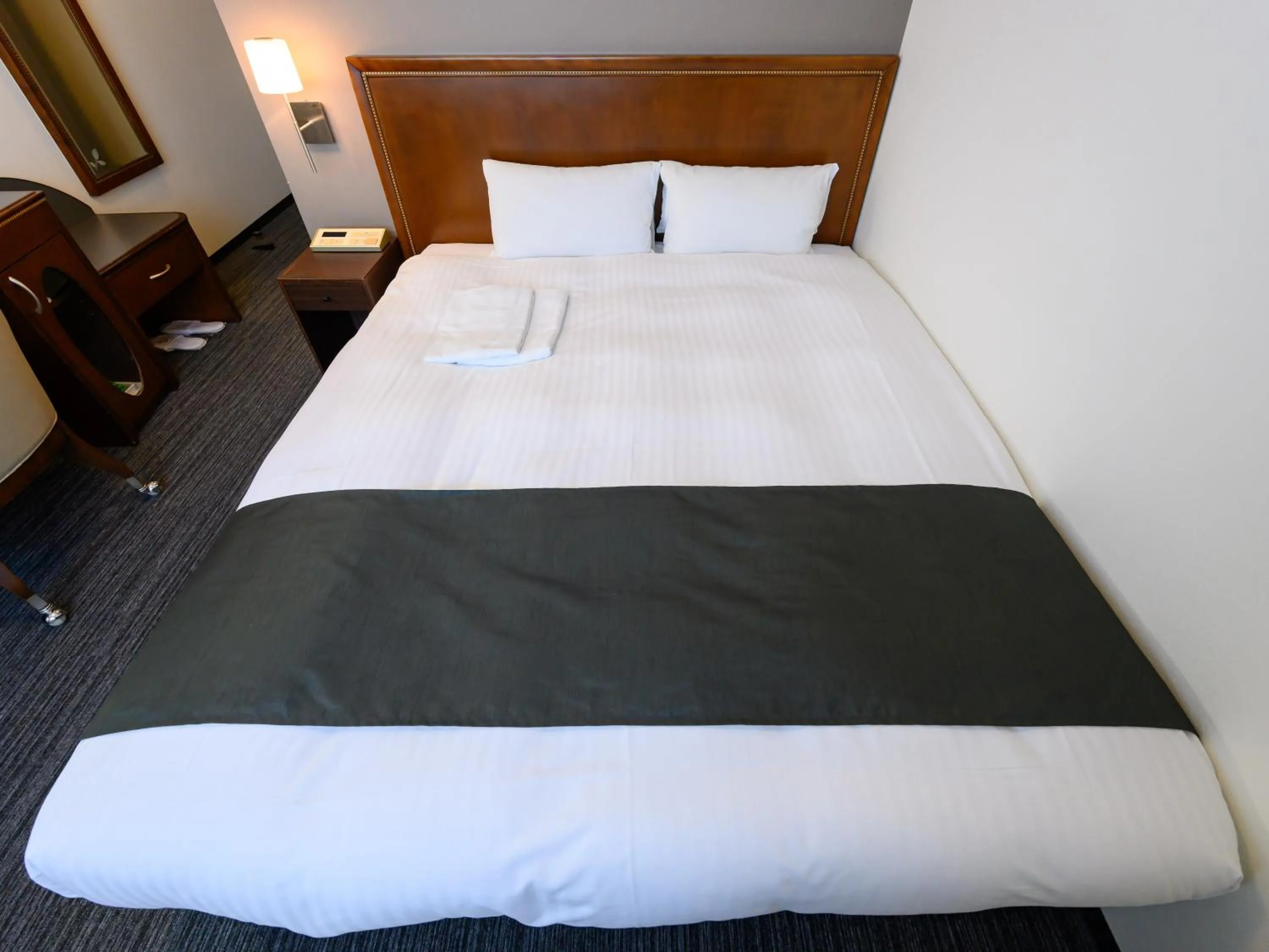 Bed in Hotel Green Park Tsu