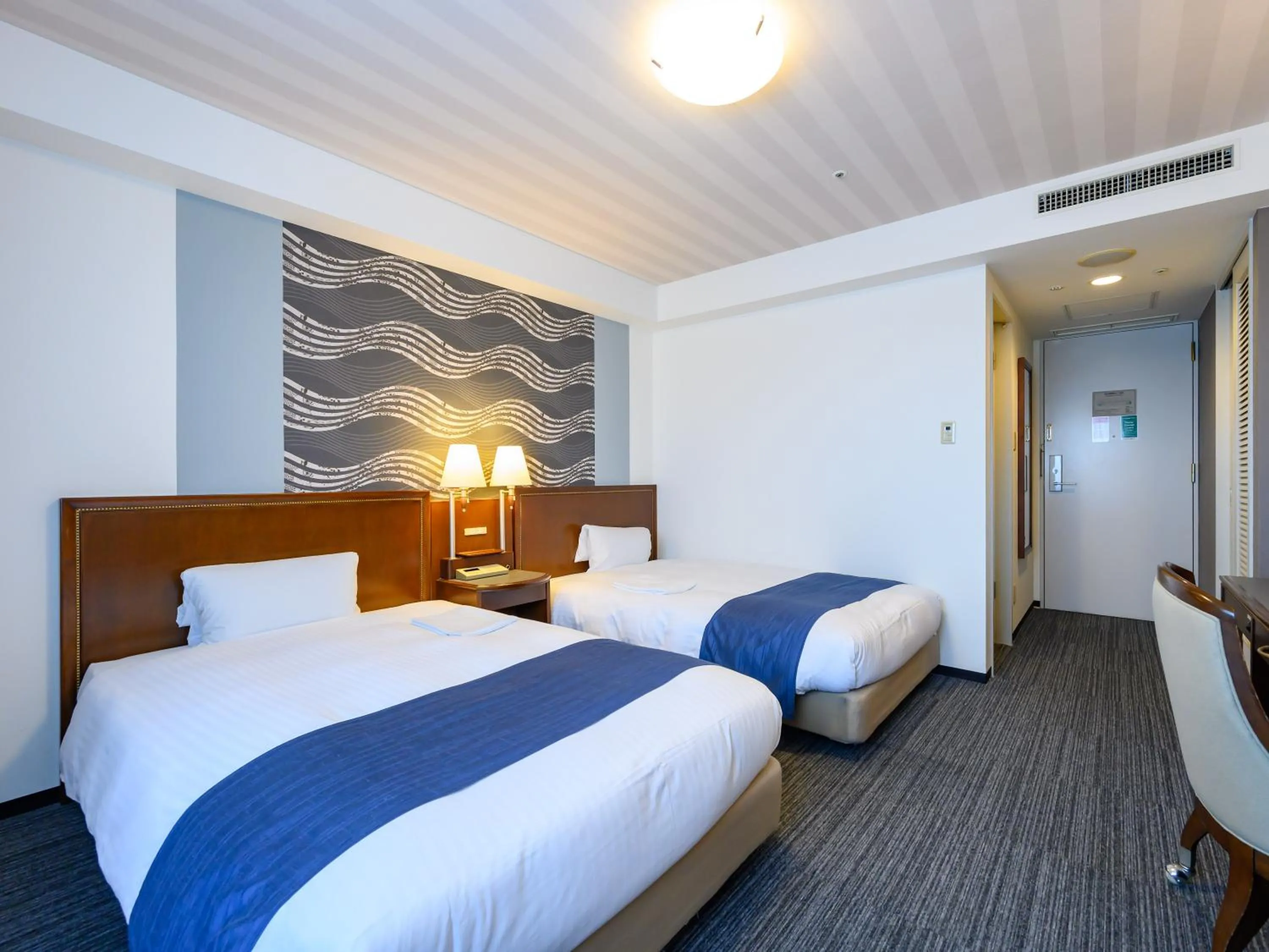 Bed in Hotel Green Park Tsu