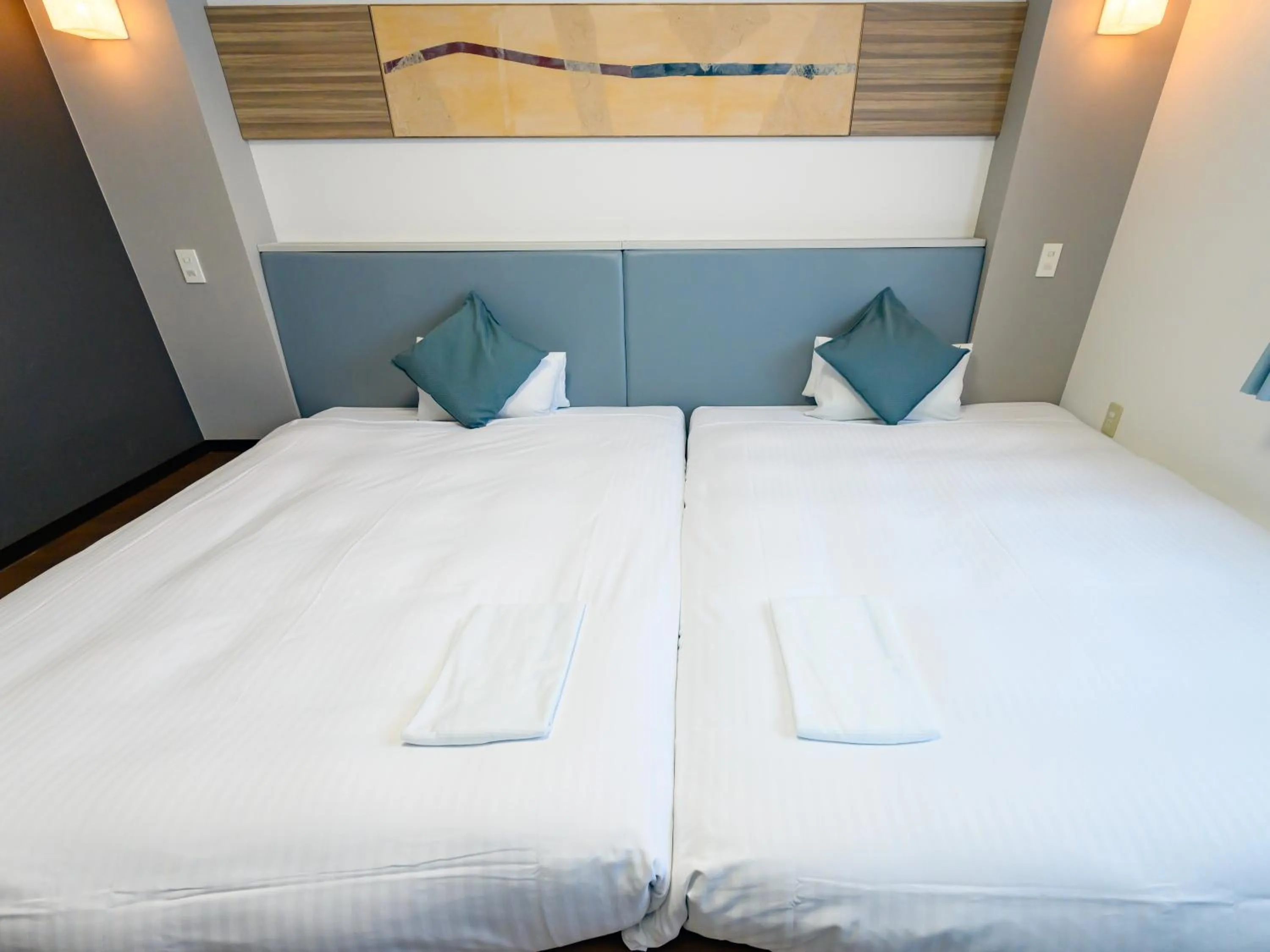 Bed in Hotel Green Park Tsu