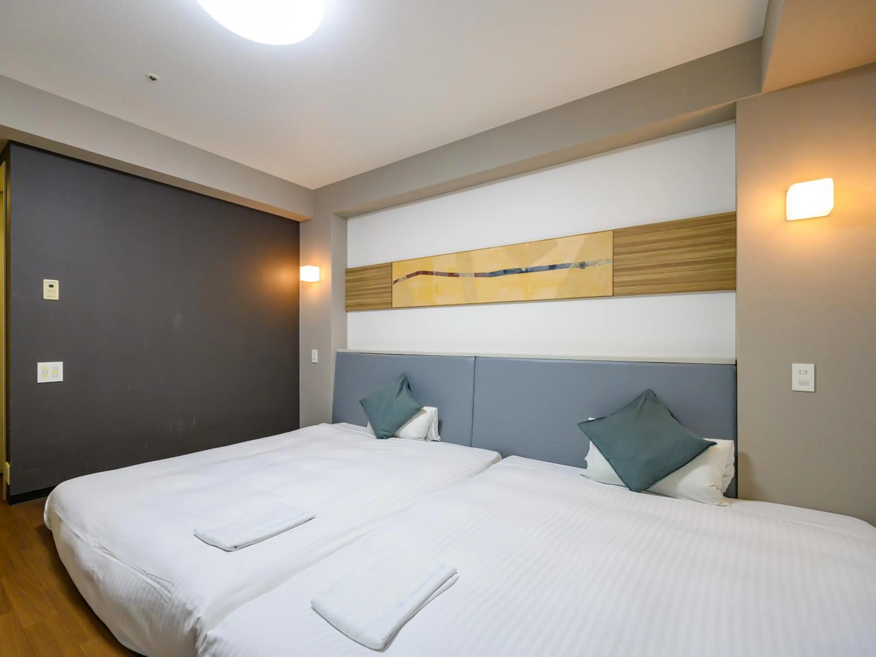 Bed in Hotel Green Park Tsu