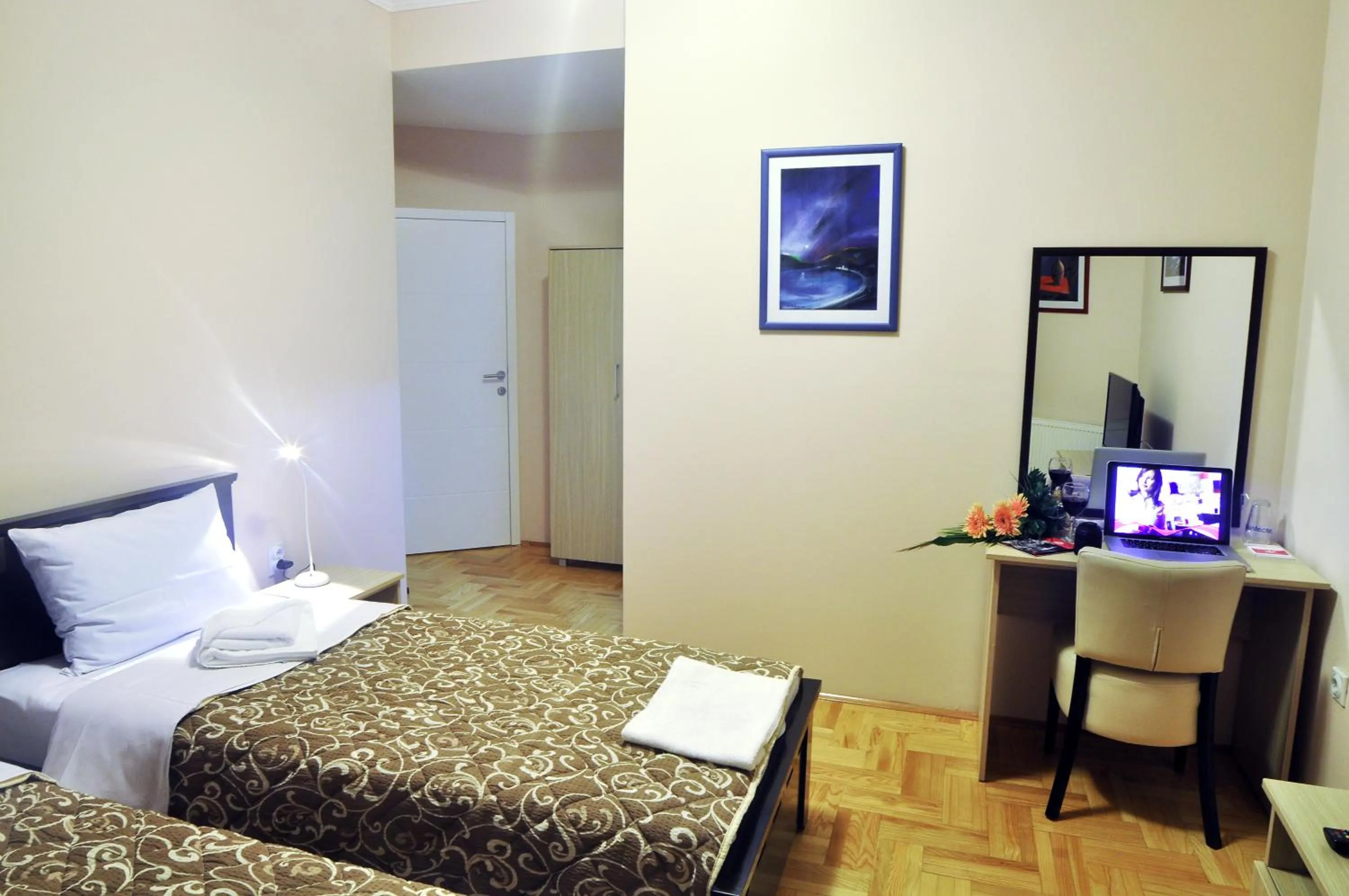 Bed in Garni Hotel Lotos