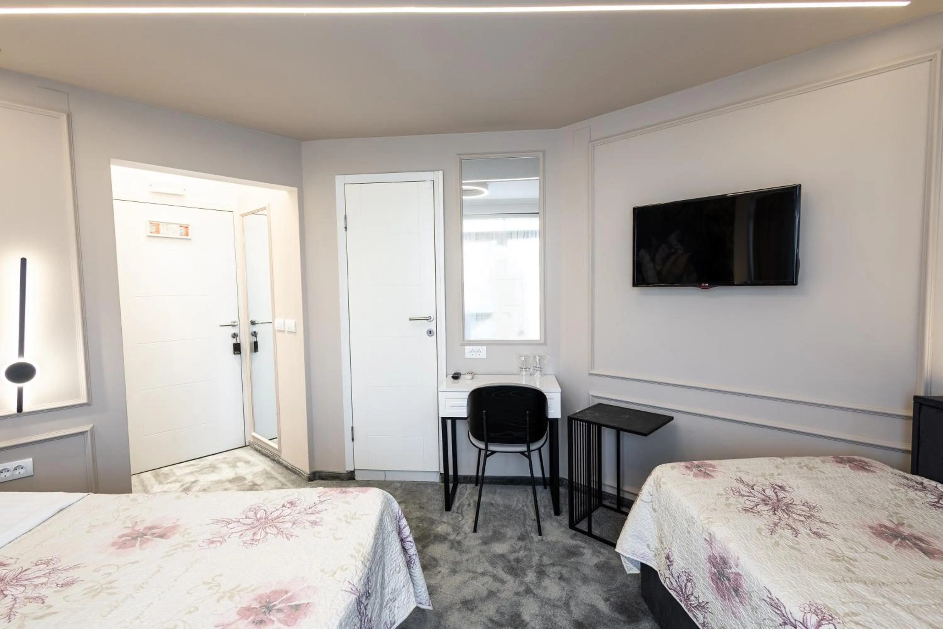 Bed in Garni Hotel Lotos