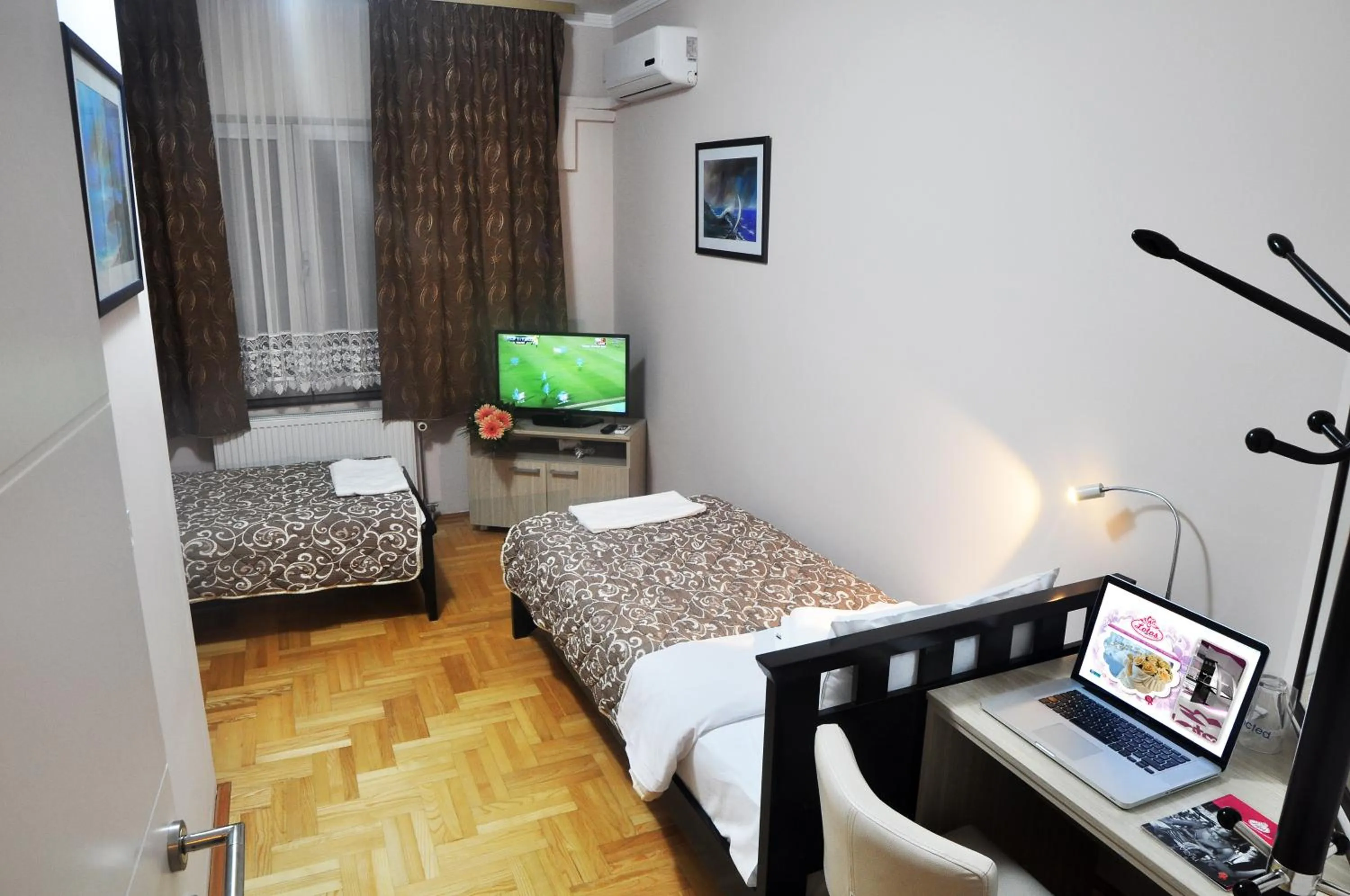 Bed in Garni Hotel Lotos