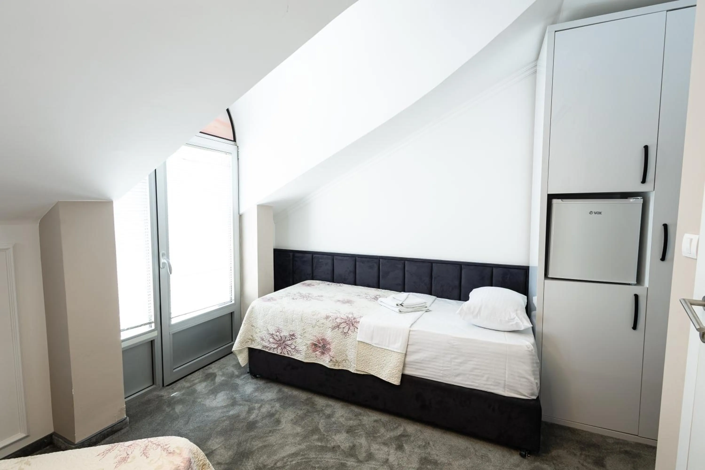 Bed in Garni Hotel Lotos