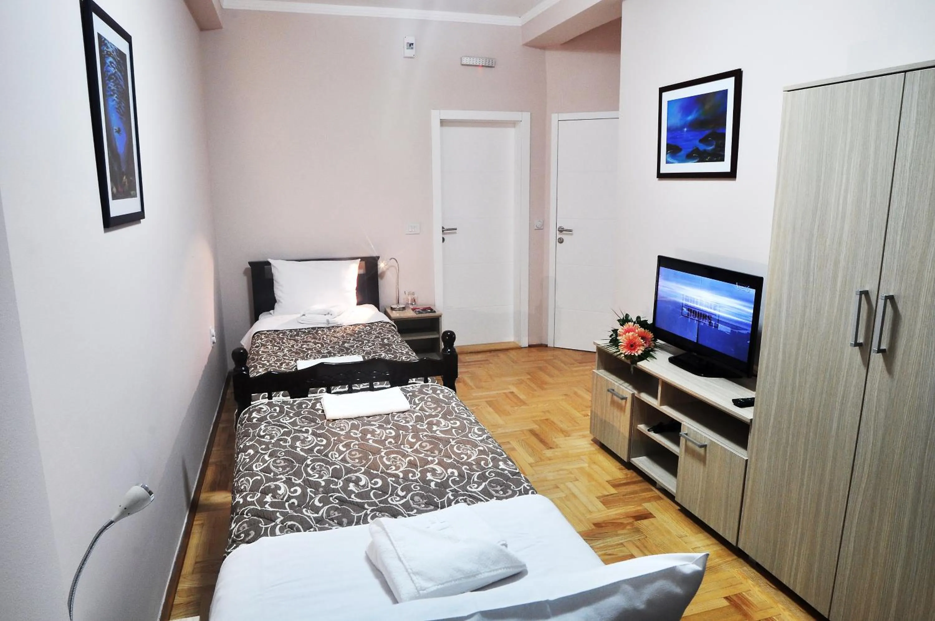 Bed in Garni Hotel Lotos