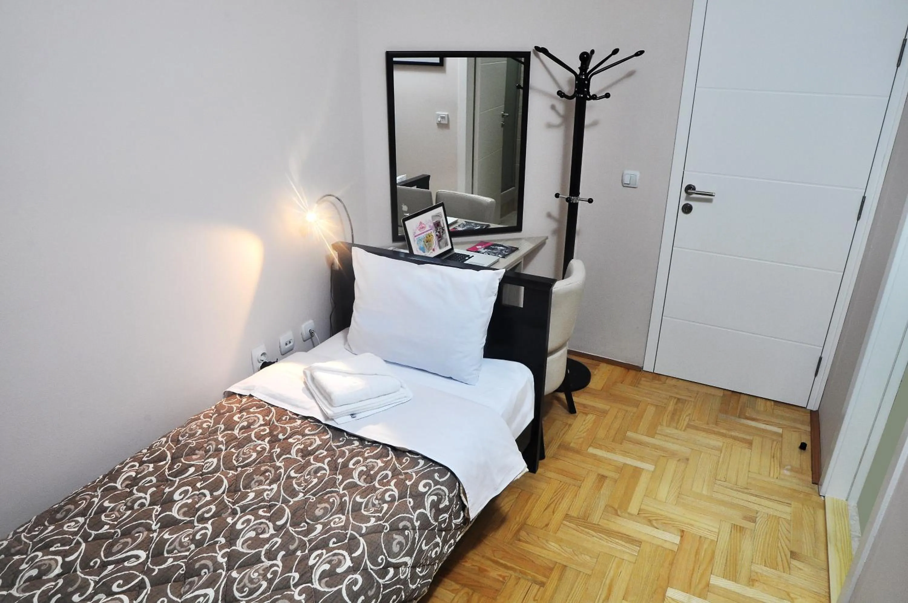 Bed in Garni Hotel Lotos