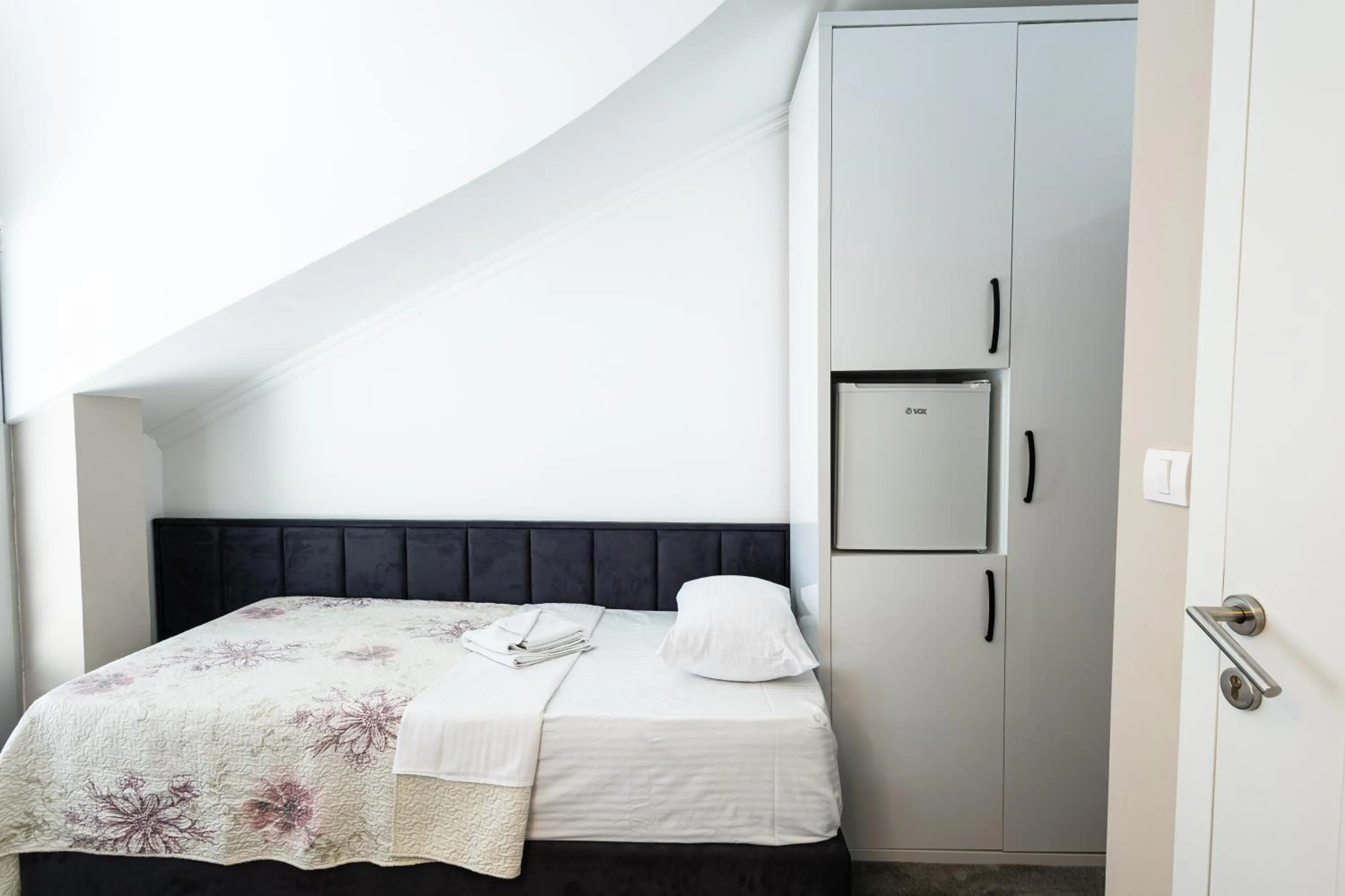 Bed in Garni Hotel Lotos