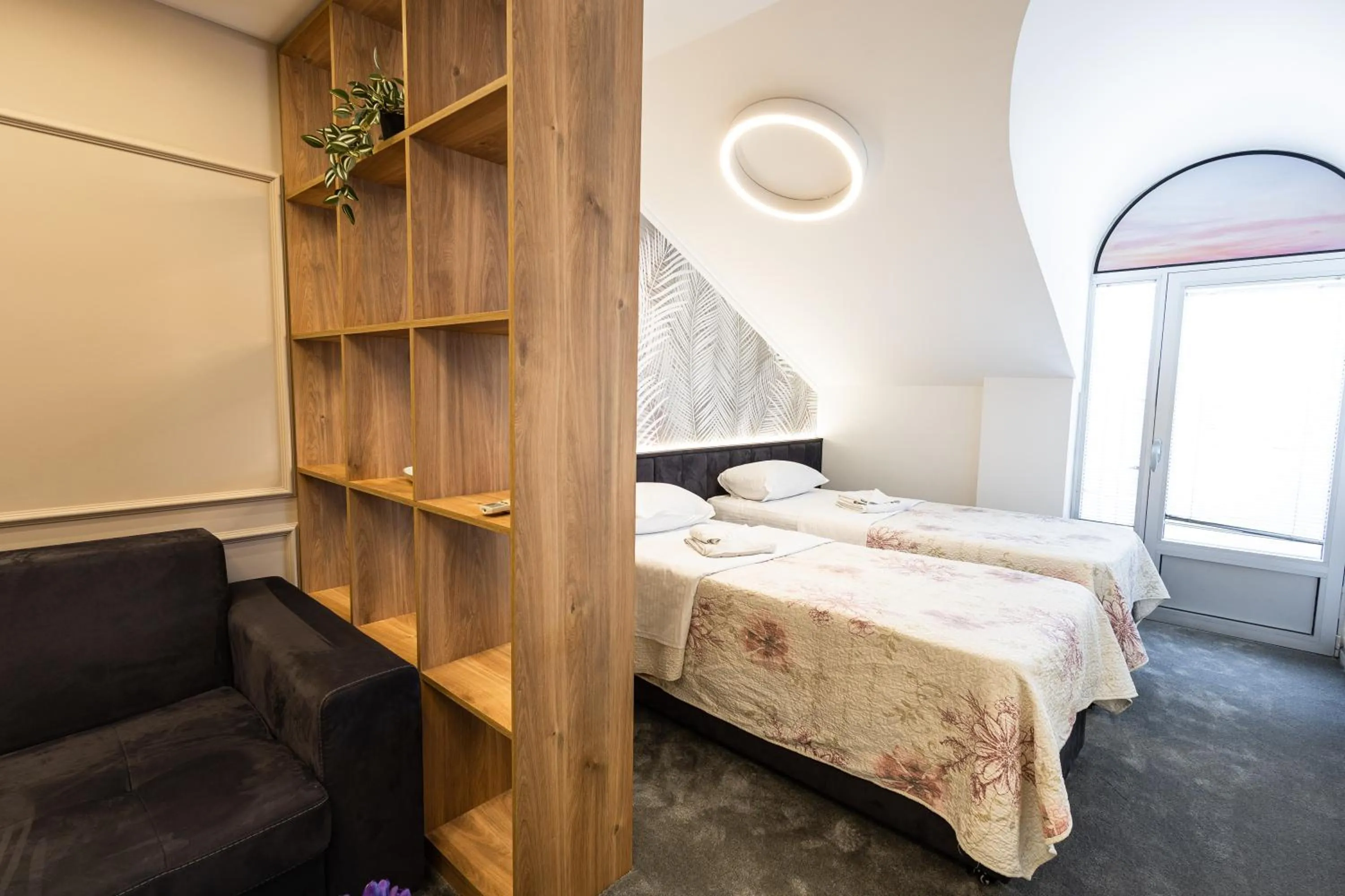 Bed in Garni Hotel Lotos