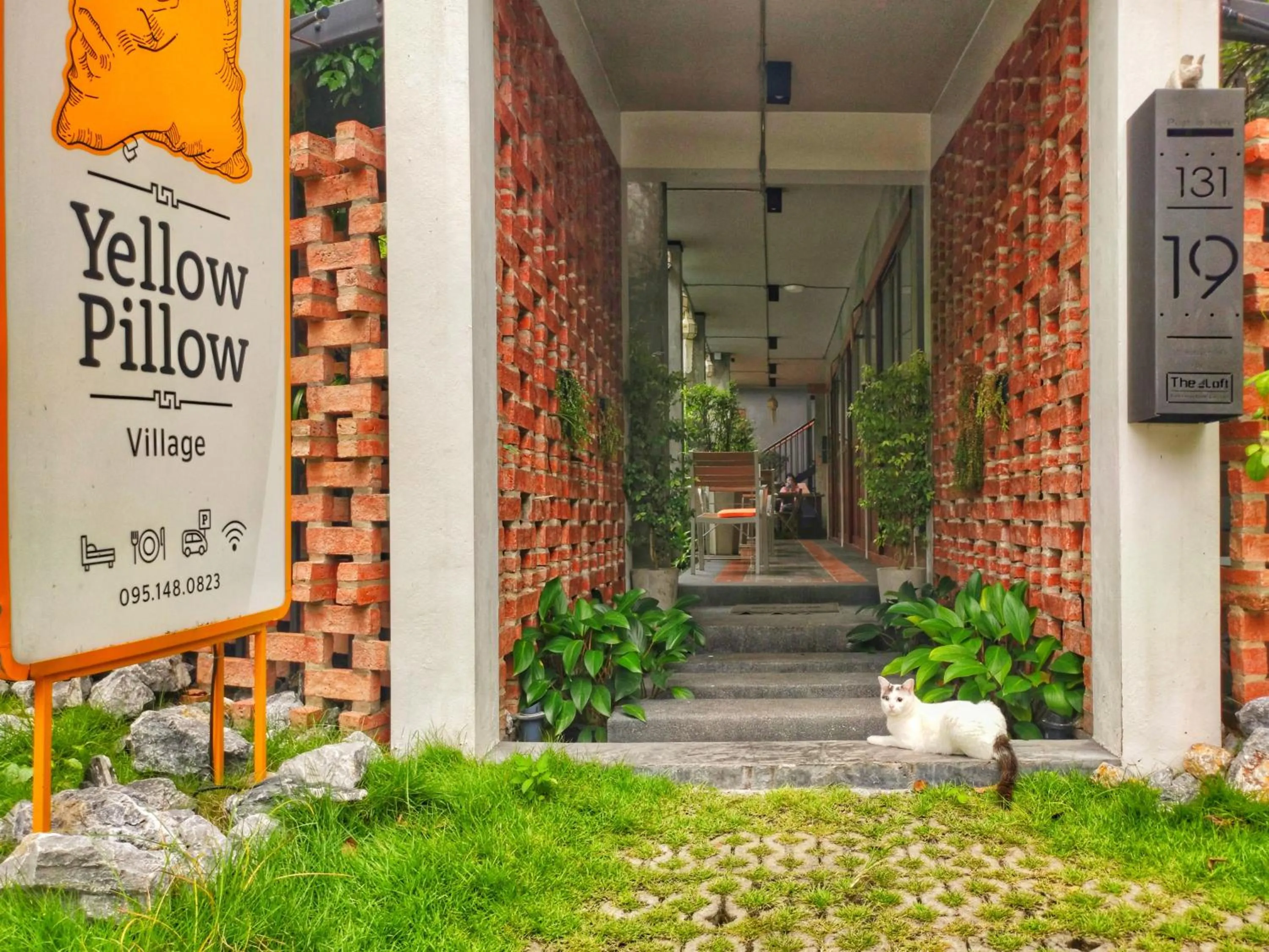 Property logo or sign in Yellow Pillow village