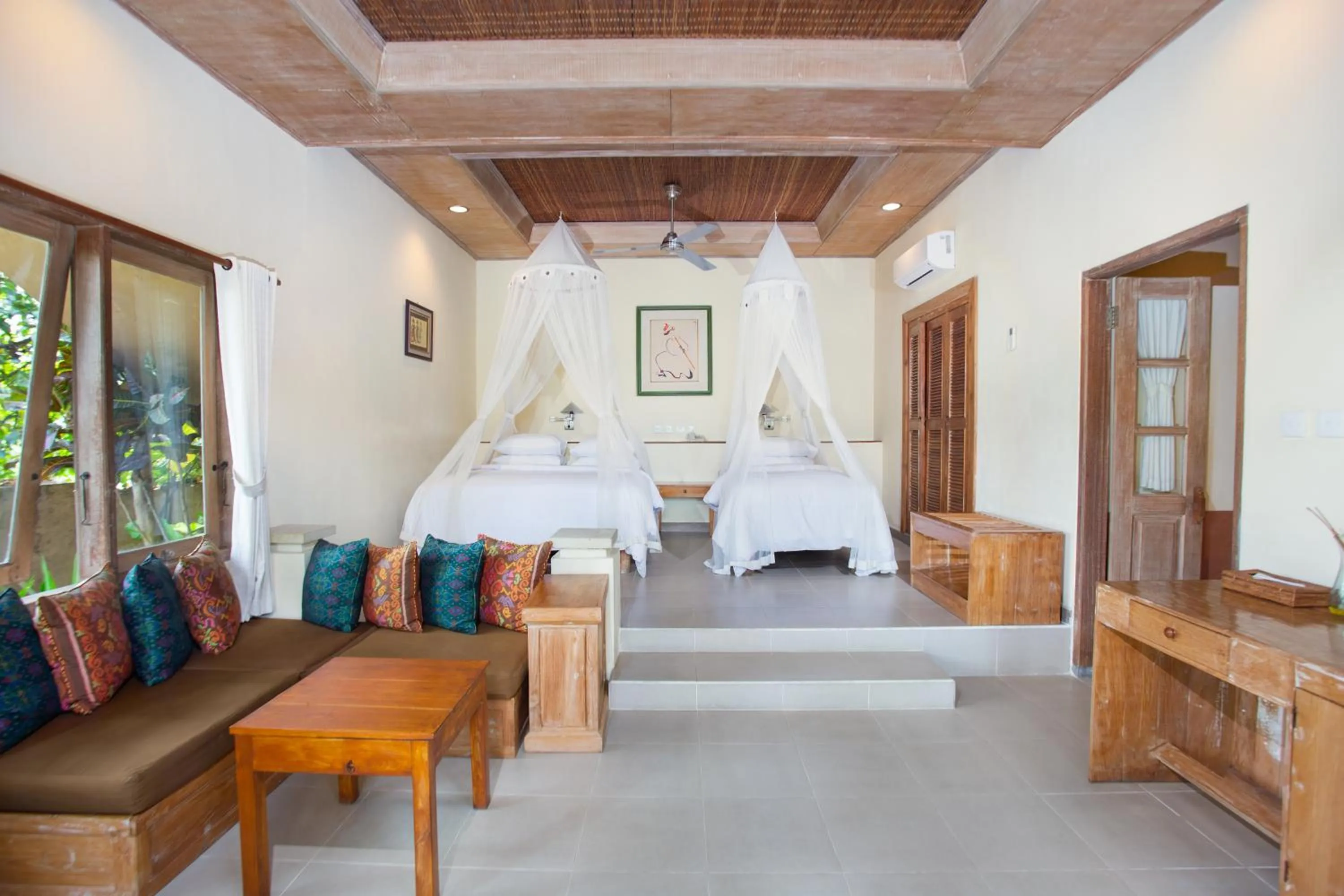 Bed in Tegal Sari Accommodation Ubud