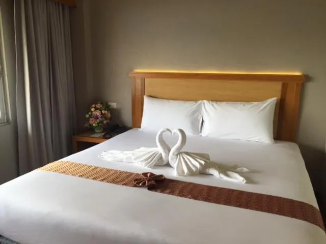 Bed in D-ONE Hotel