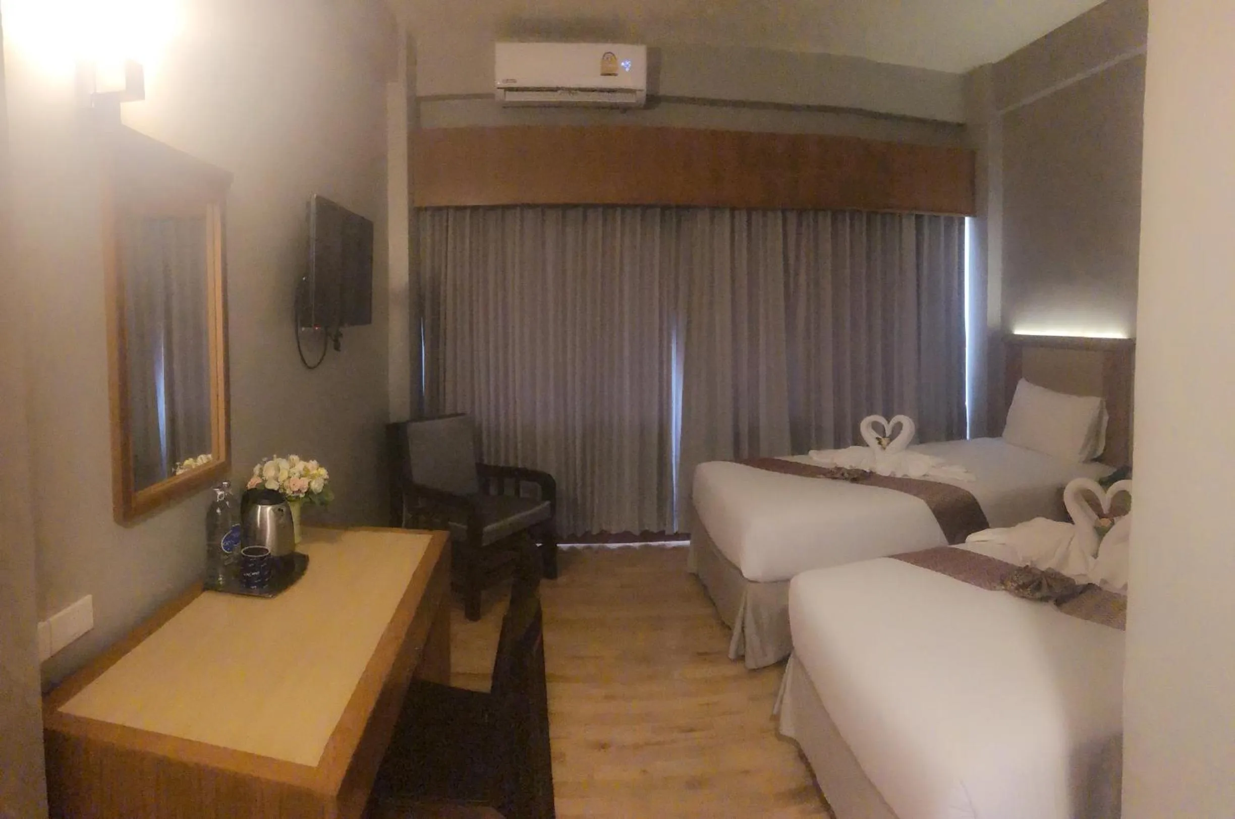 Bed in D-ONE Hotel