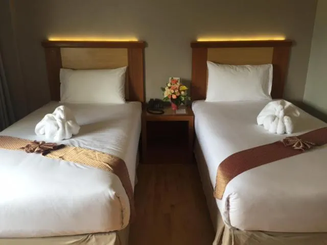 Bed in D-ONE Hotel