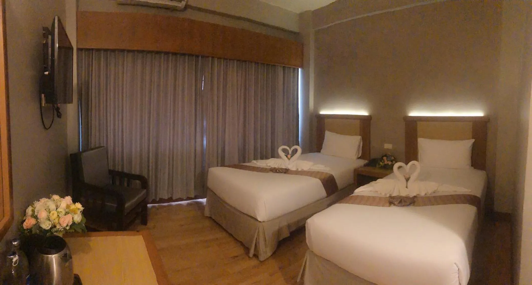 Bed in D-ONE Hotel
