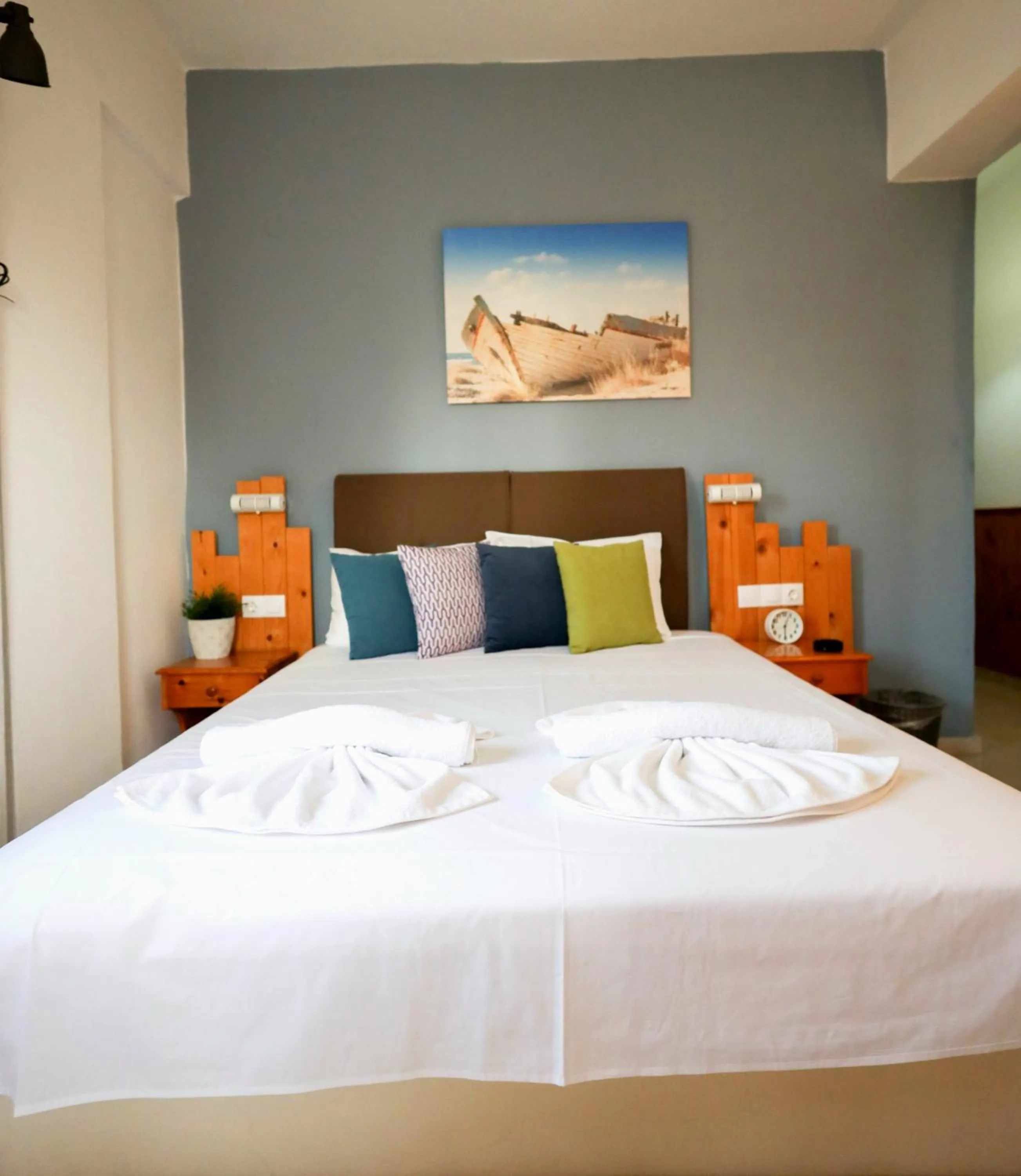 Photo of the whole room, Bed in Malia Boutique Studios