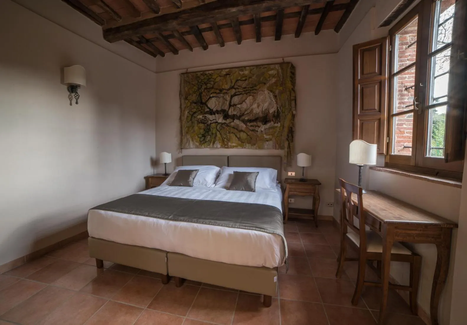 Bed in Relais Corte Rodeschi