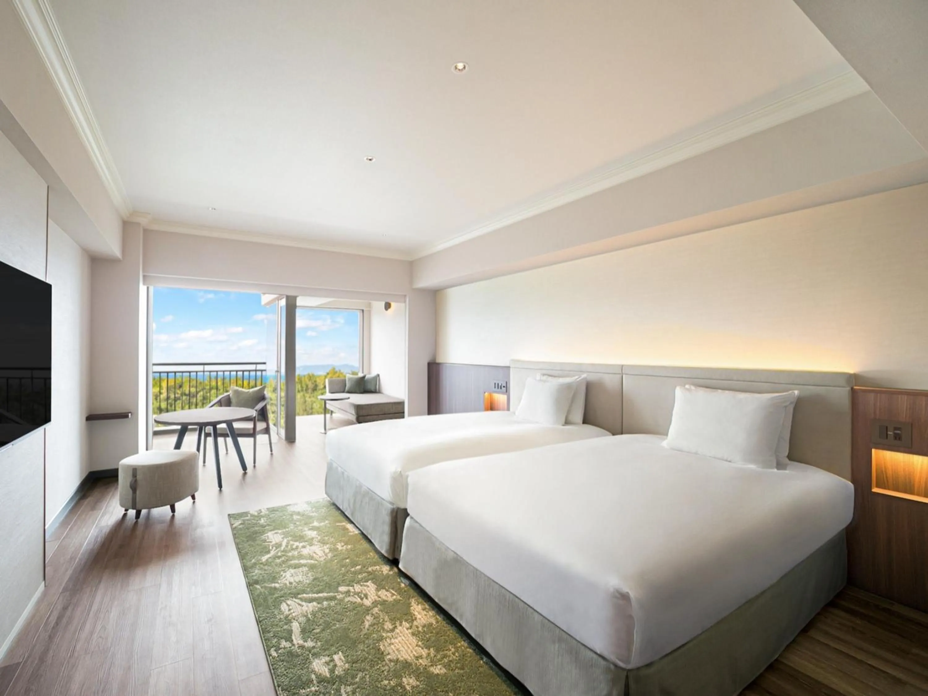 Bed in Oriental Hotel Okinawa Resort & Spa