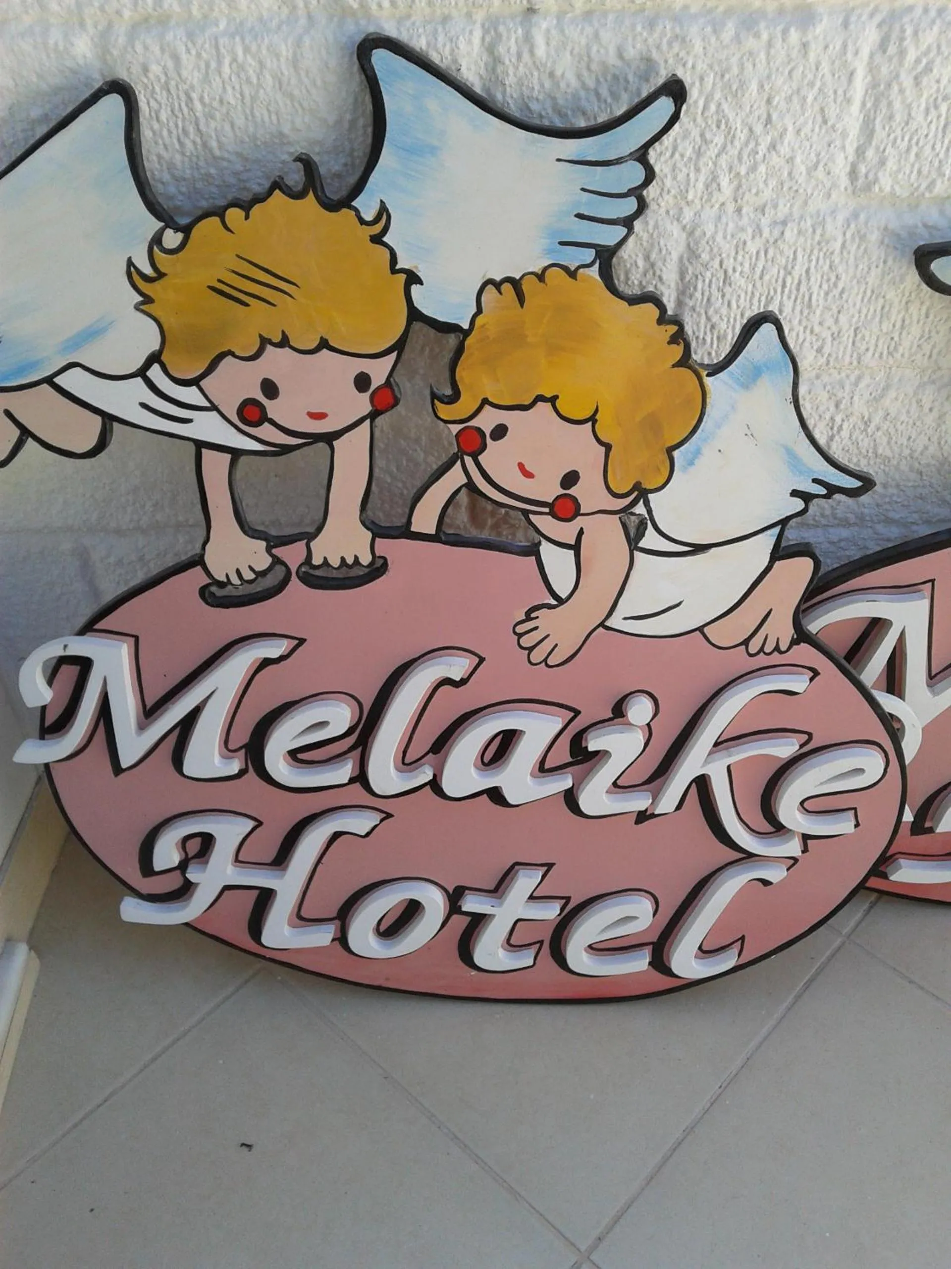Property logo or sign in Melaike Hotel