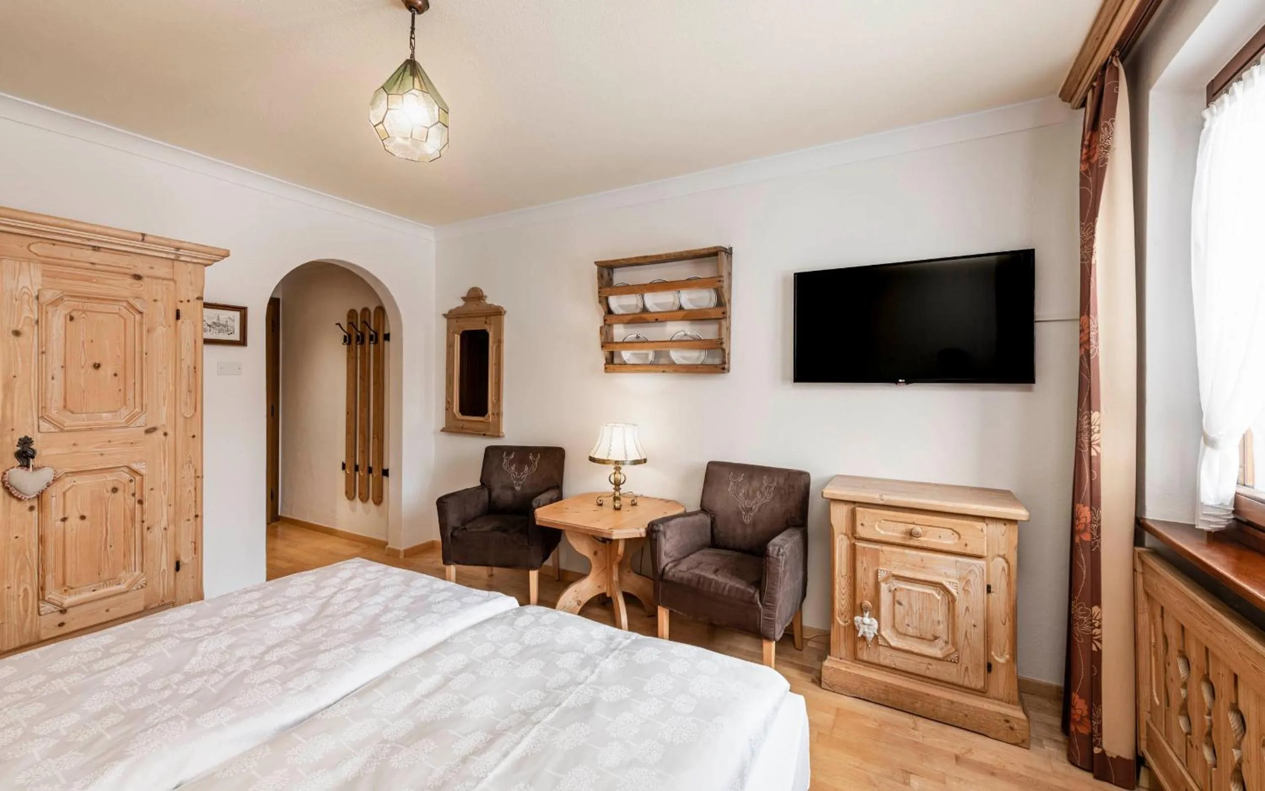 Seating area, Bed in Hotel Cavallino D'Oro Bed&Breakfast