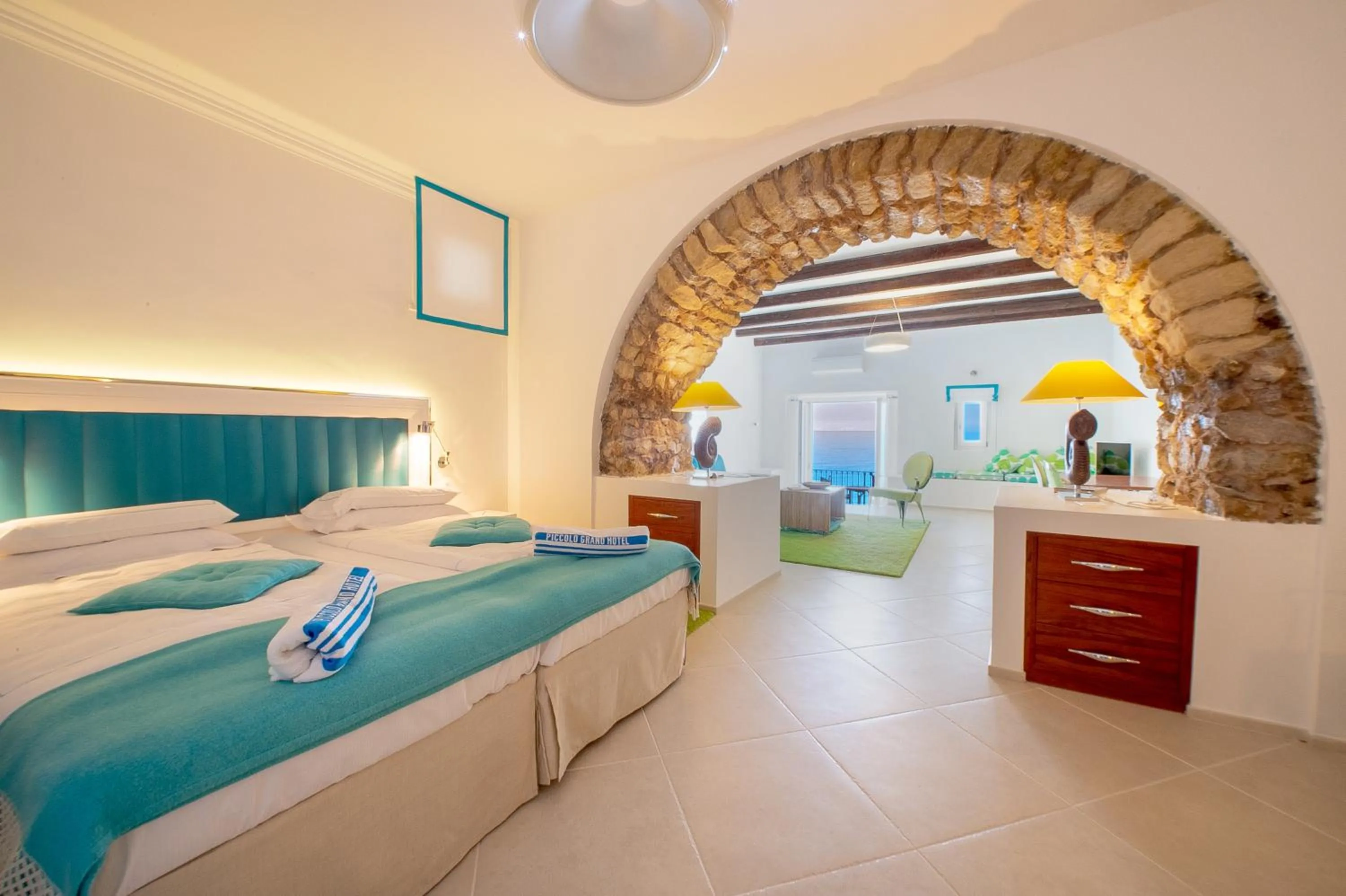 Photo of the whole room, Bed in Piccolo Grand Hotel