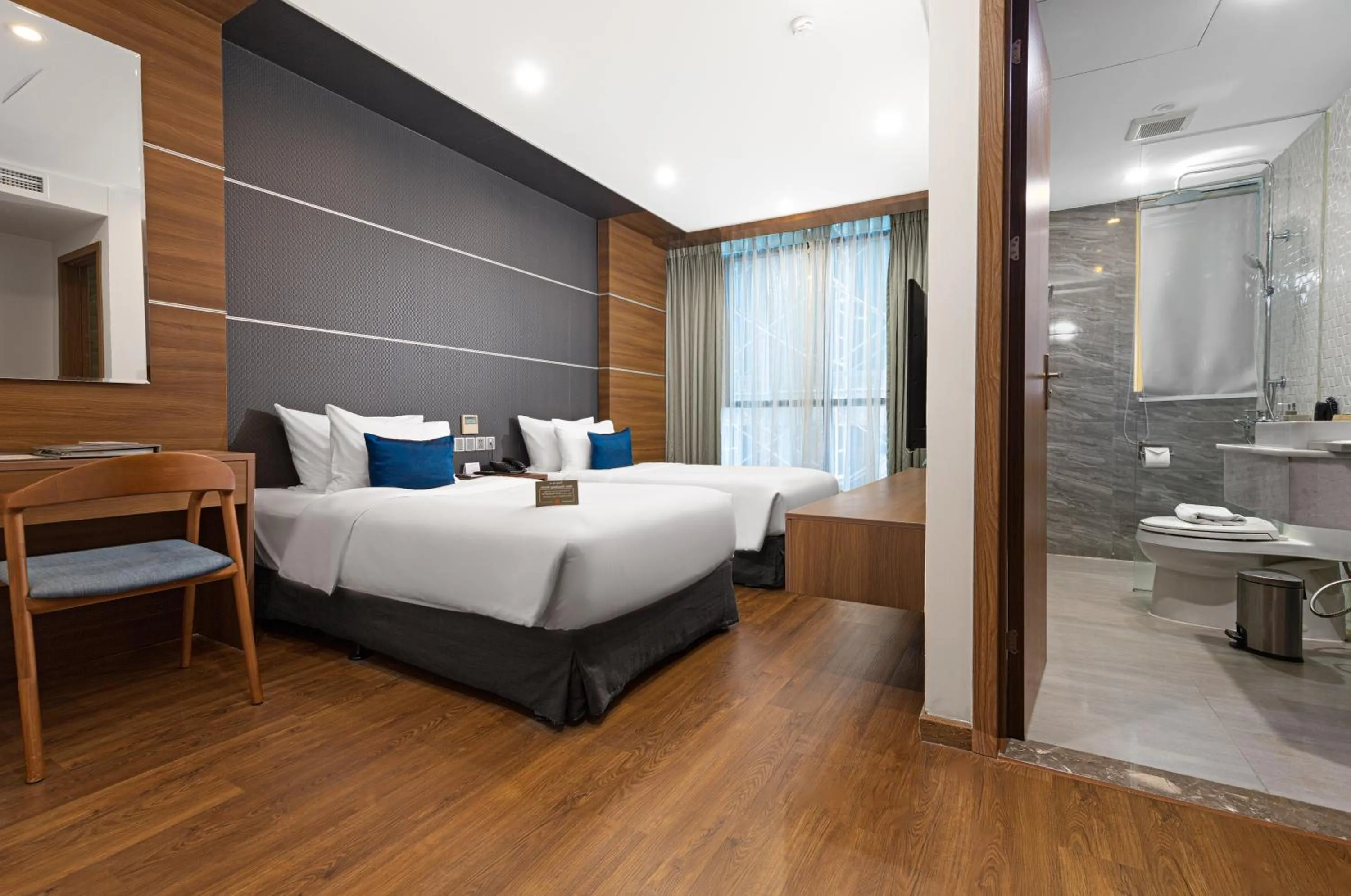 Bed in HAIAN Beach Hotel & Spa