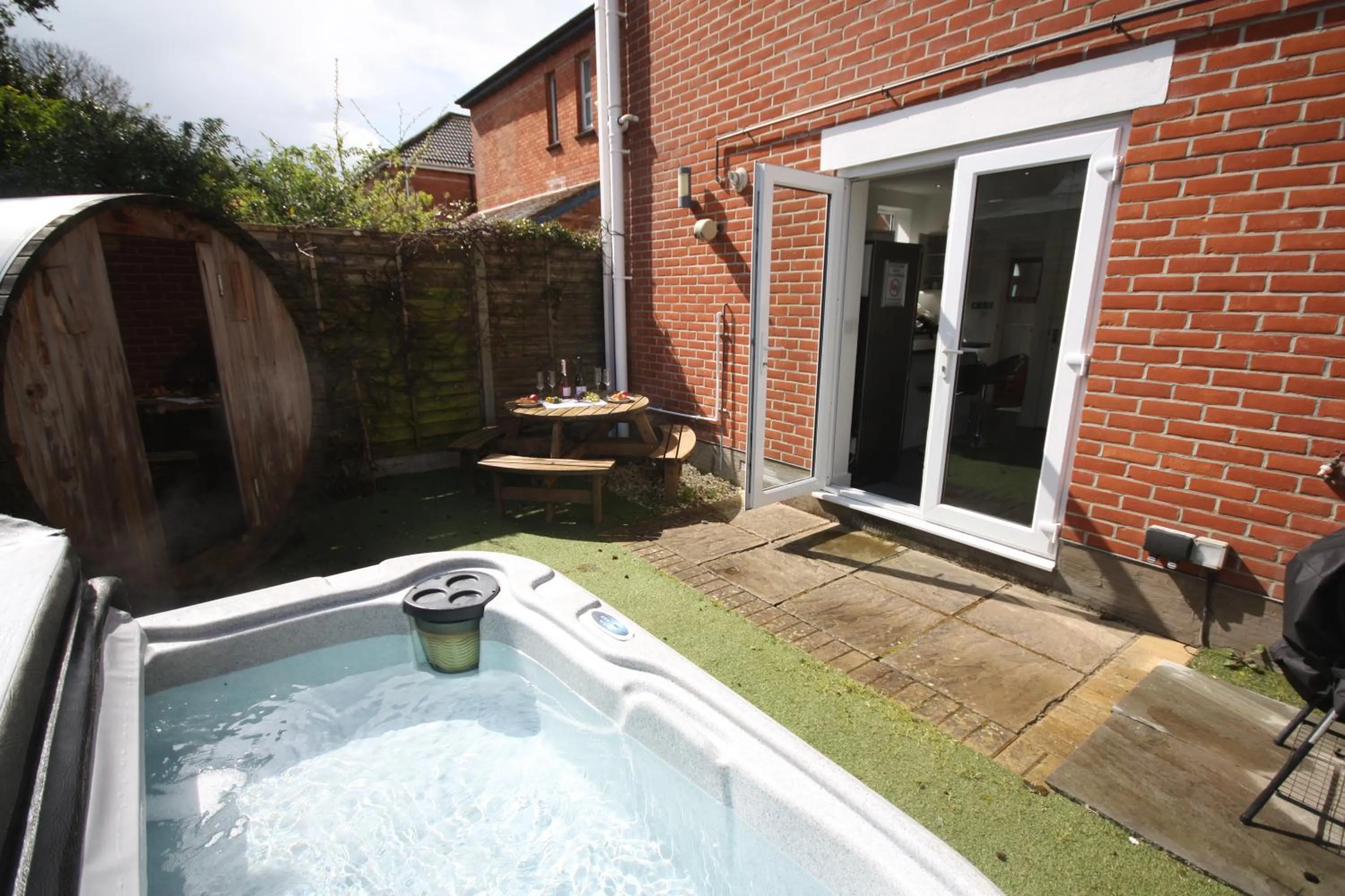 Garden in Holiday Home Hot Tub & Sauna