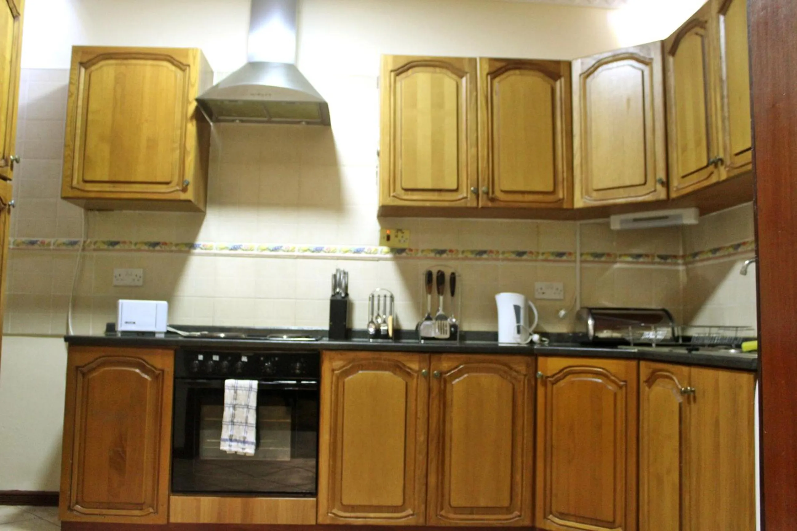 Kitchen or kitchenette in Avon Apartments