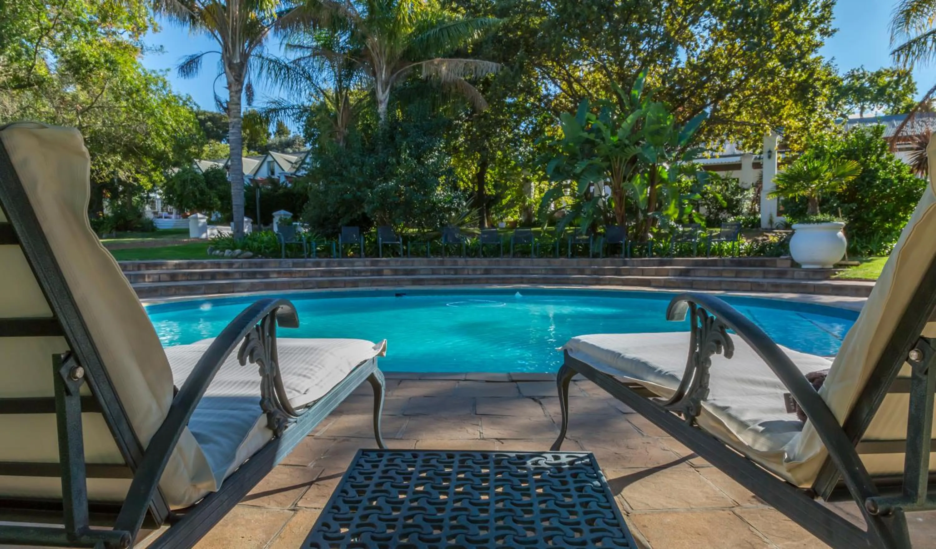Pool view in Le Manoir de Brendel