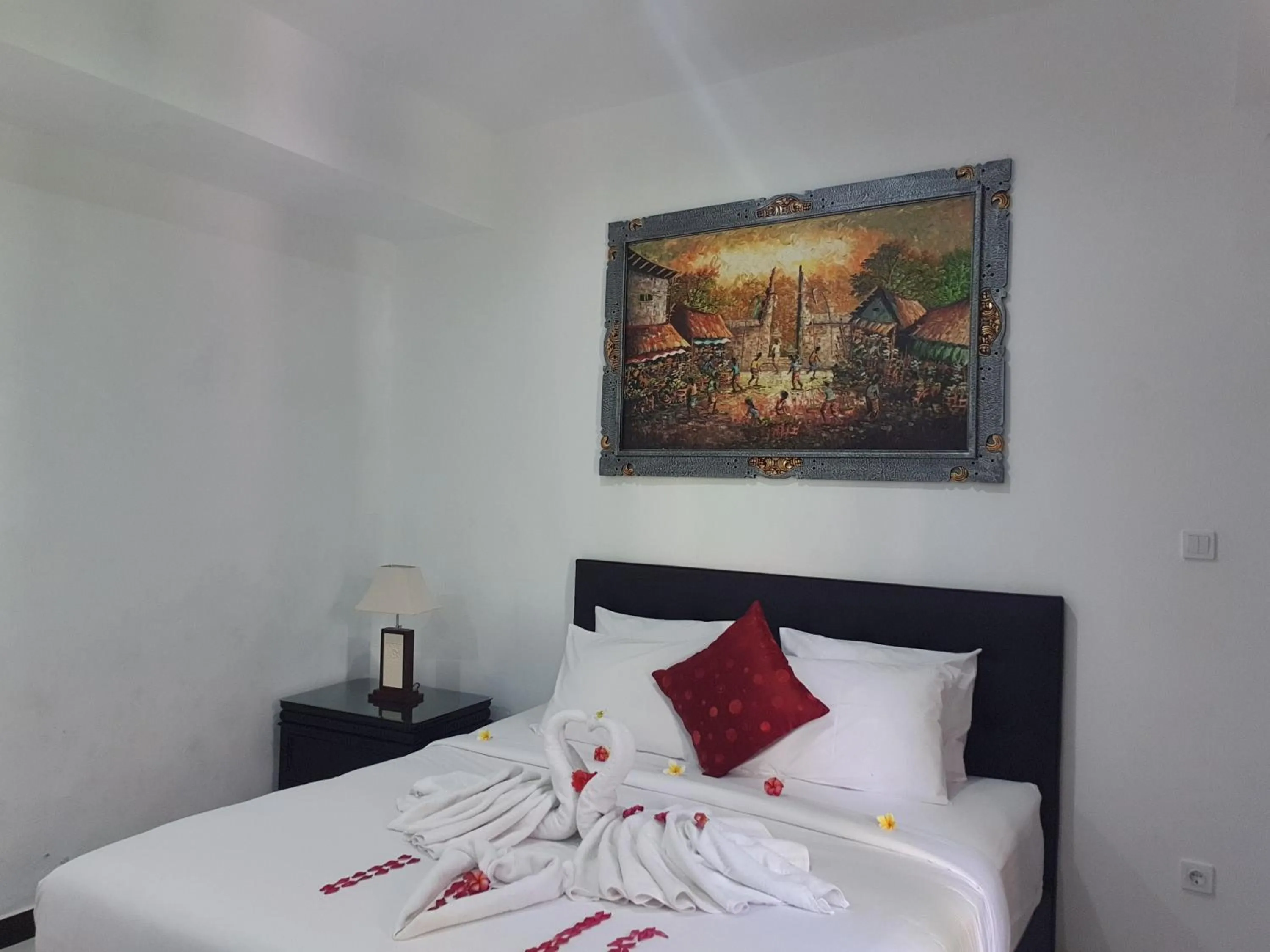 Bed in Palm Bamboo Hotel