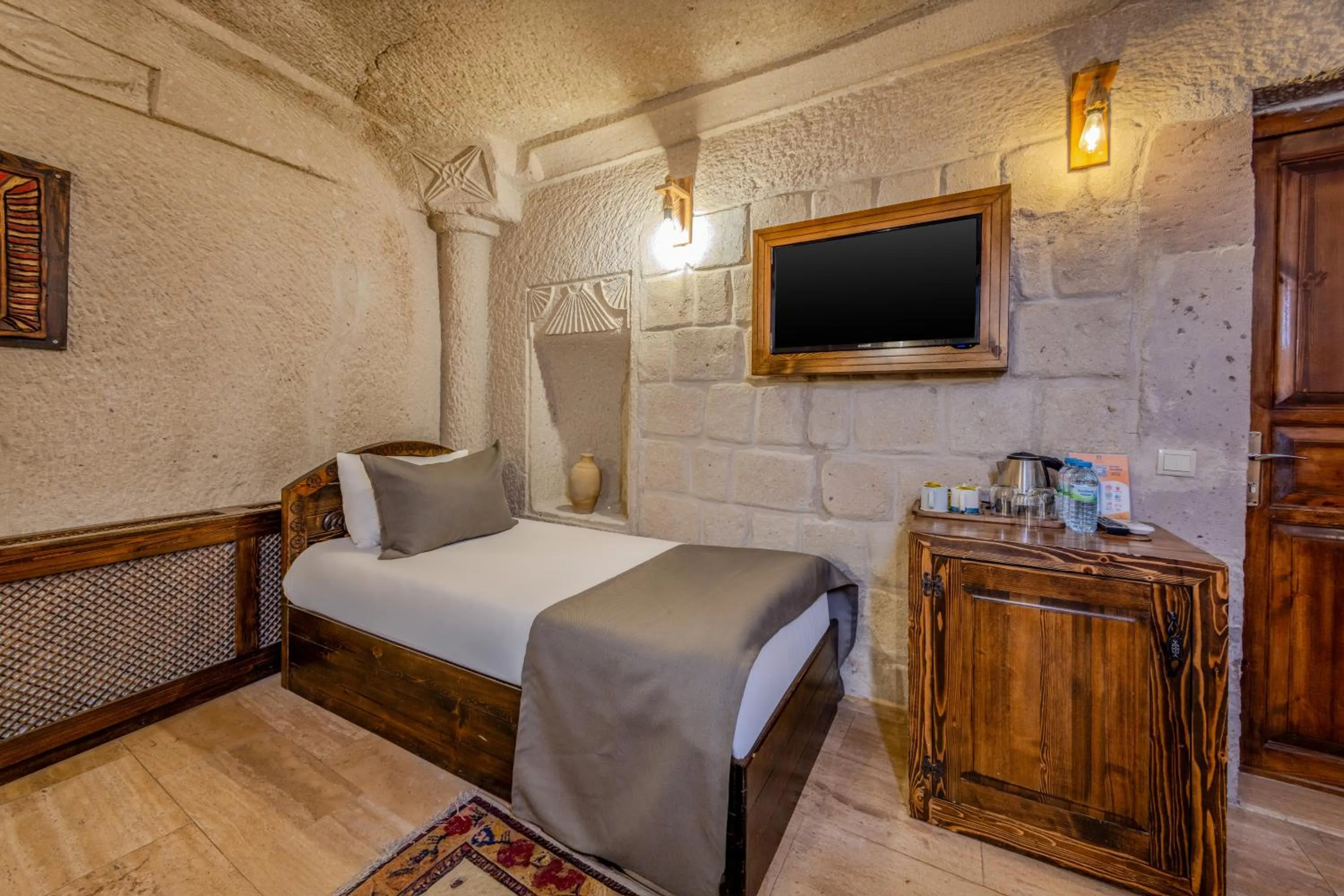 Bed in Castle Cave Hotel