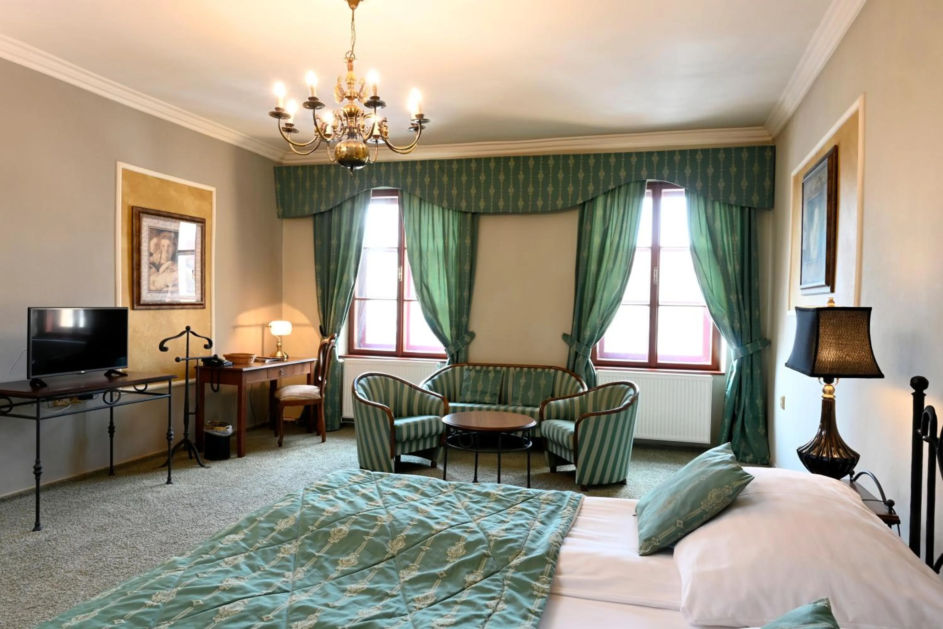 Living room, Bed in Hotel Bouček