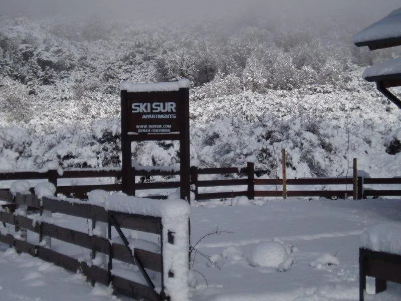 Property logo or sign in Ski Sur Apartments