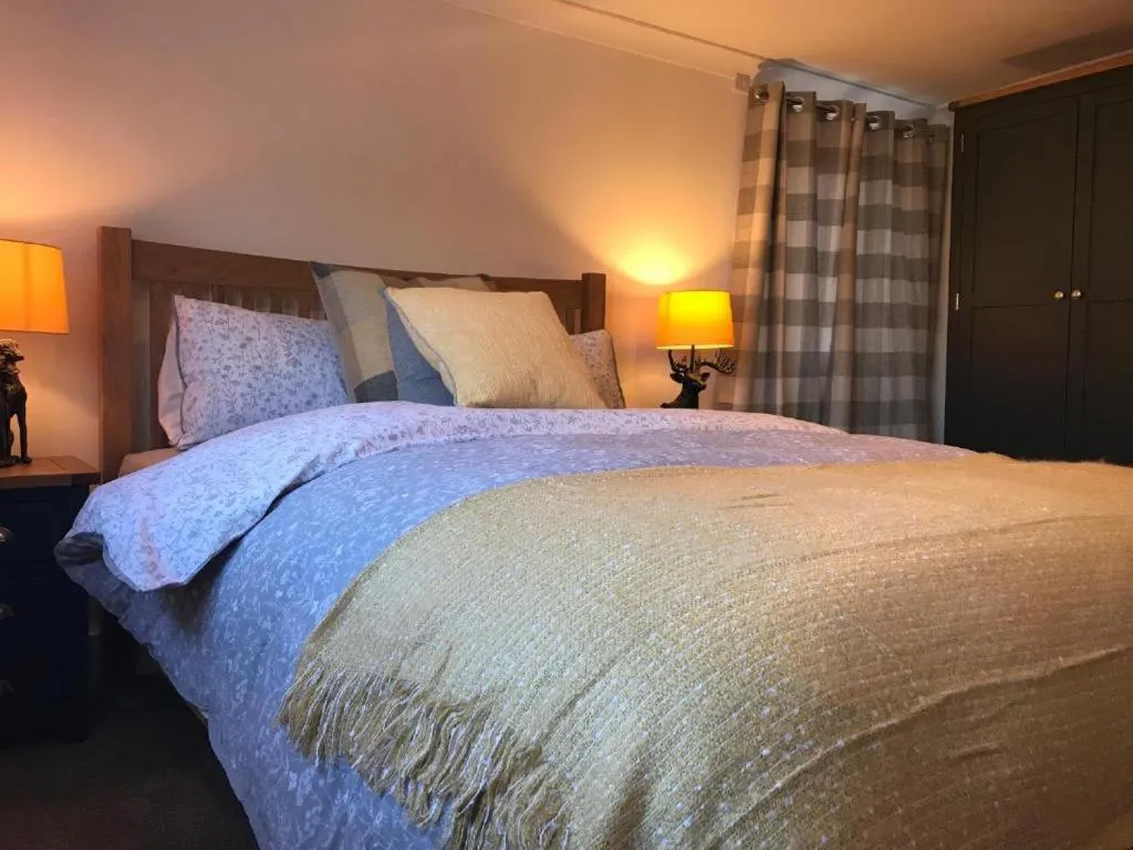 Bed in Ye Olde Saddlery B&B