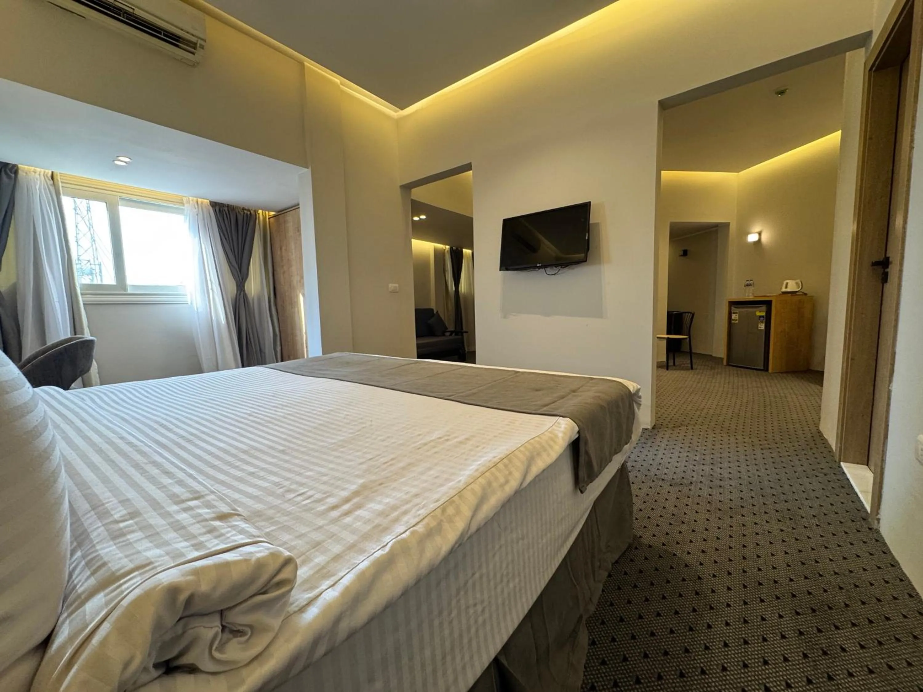 Bed in Atlas International Hotels