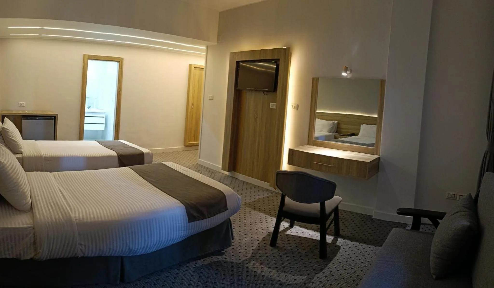 Bed in Atlas International Hotels