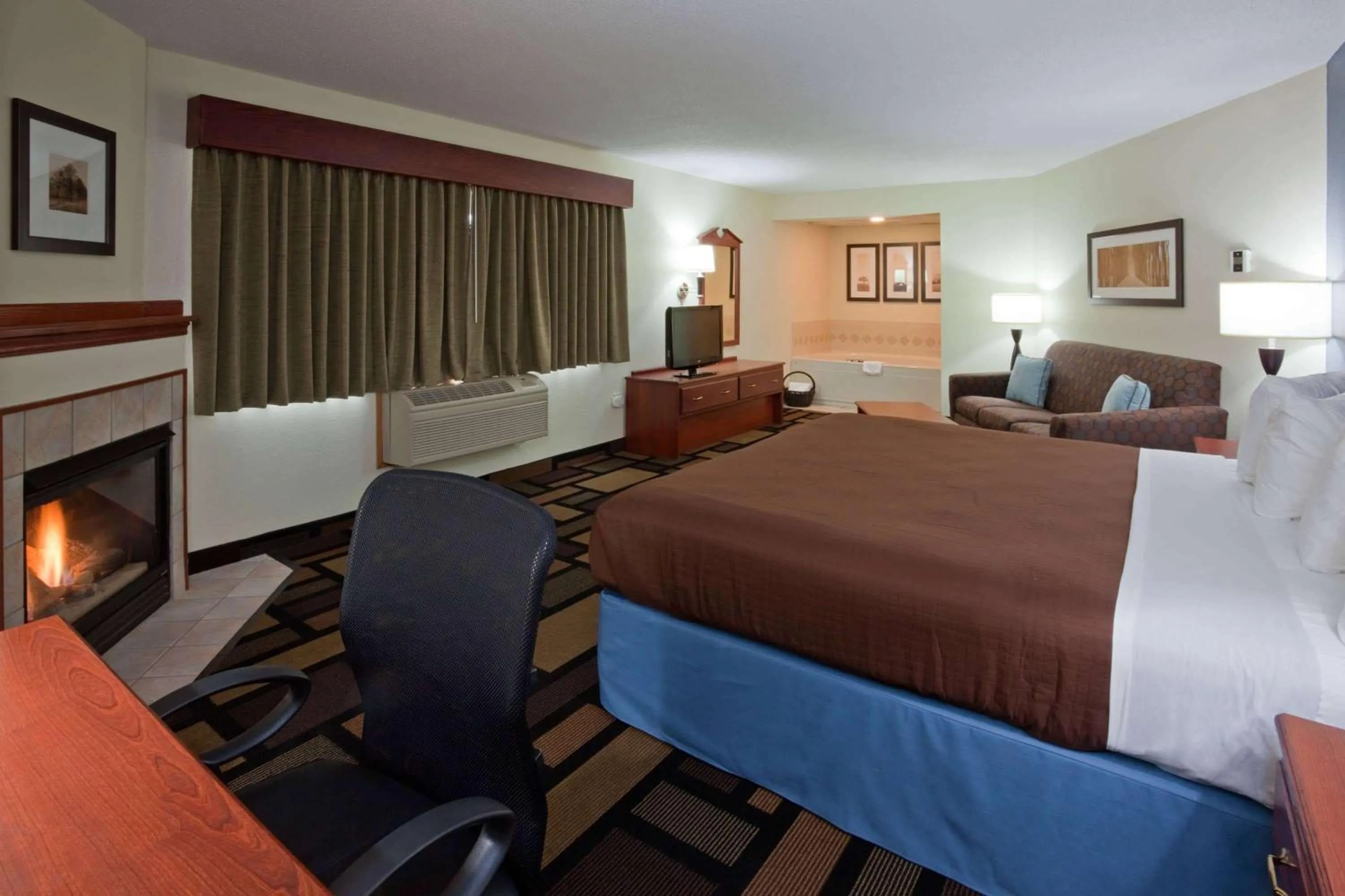 Photo of the whole room, Bed in AmericInn by Wyndham Austin