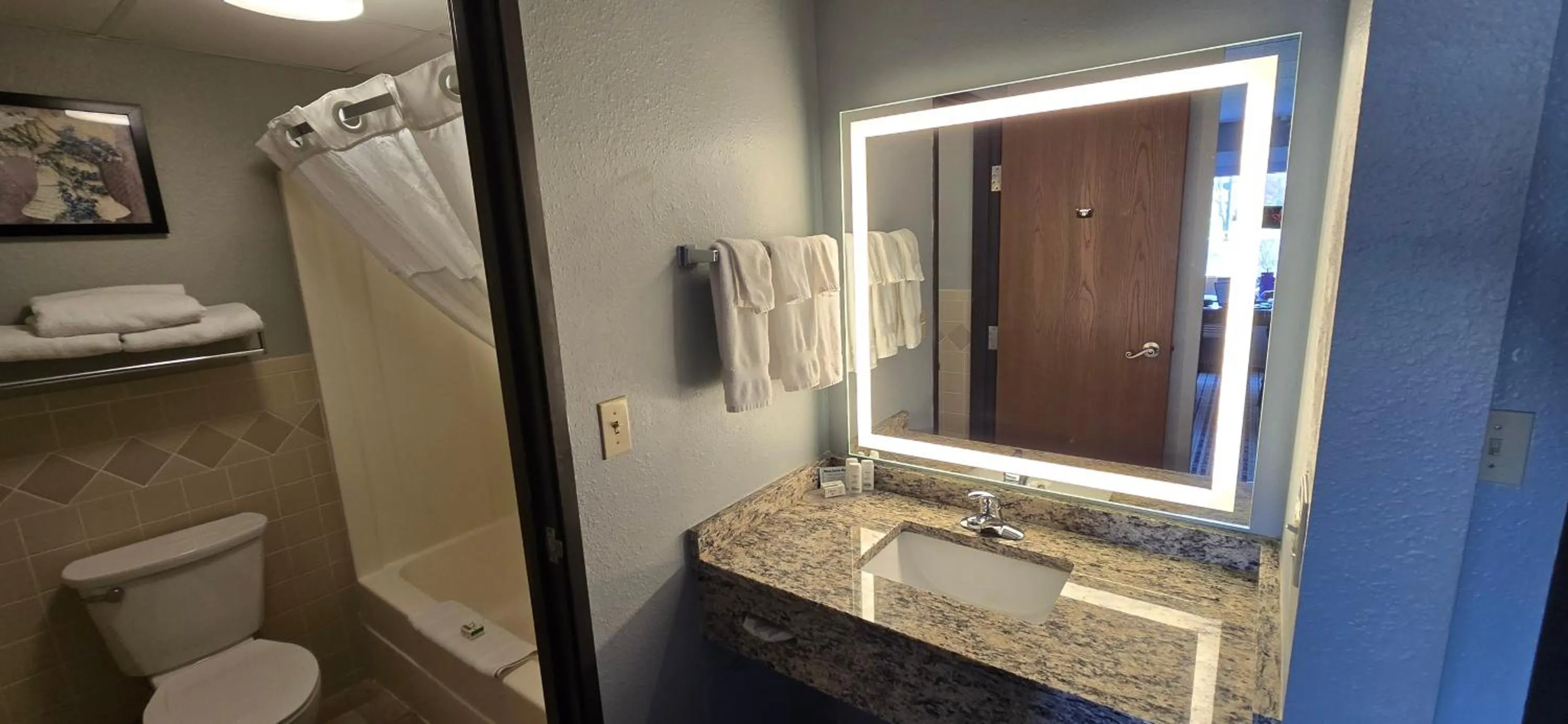 Shower in AmericInn by Wyndham Austin