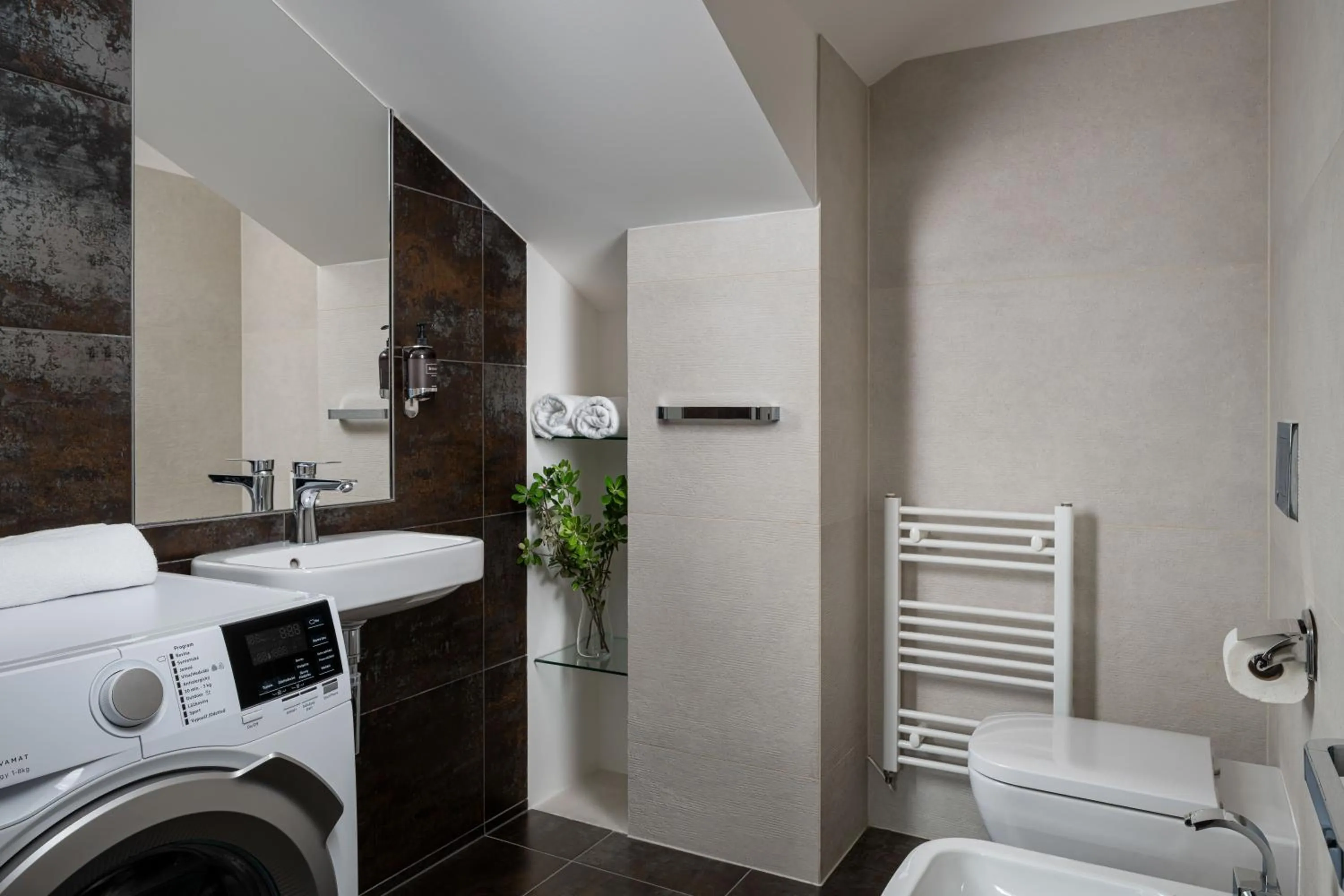 Toilet in Coco Chanel Boutique Apartment by Goodnite cz