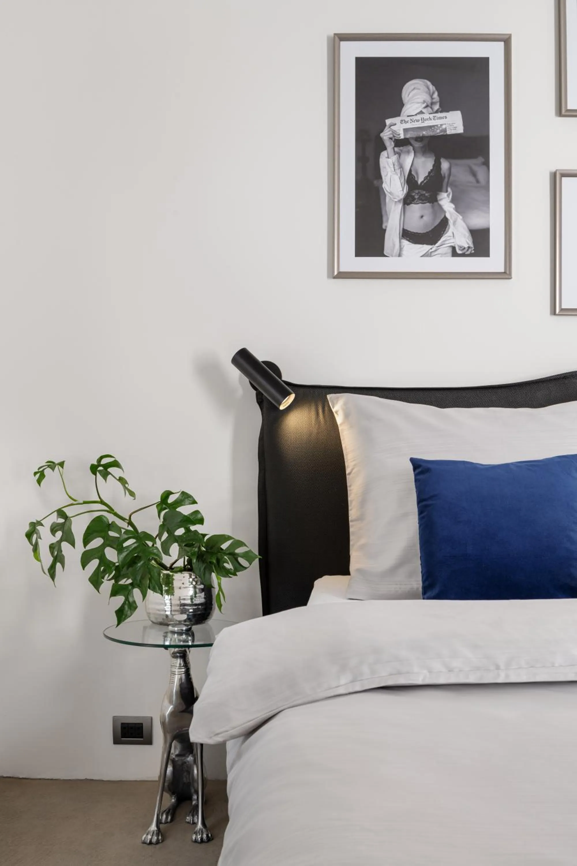 Bed in Coco Chanel Boutique Apartment by Goodnite cz