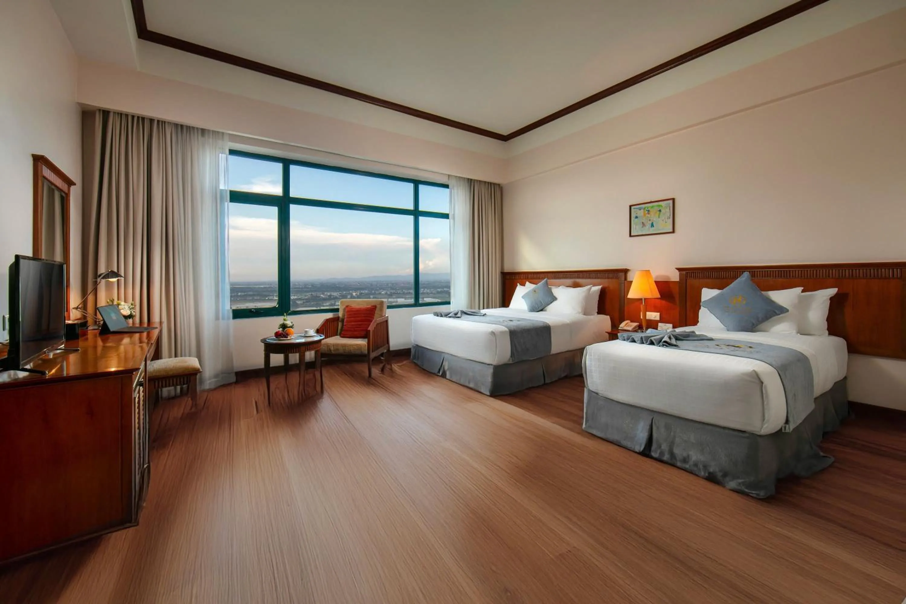 Bed in Nam Cuong Hai Duong Hotel