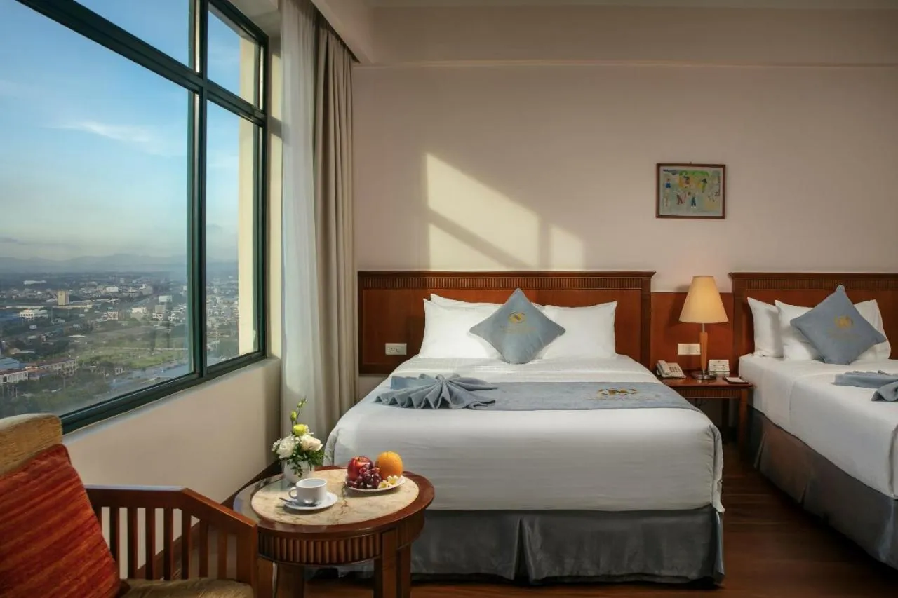 Bed in Nam Cuong Hai Duong Hotel