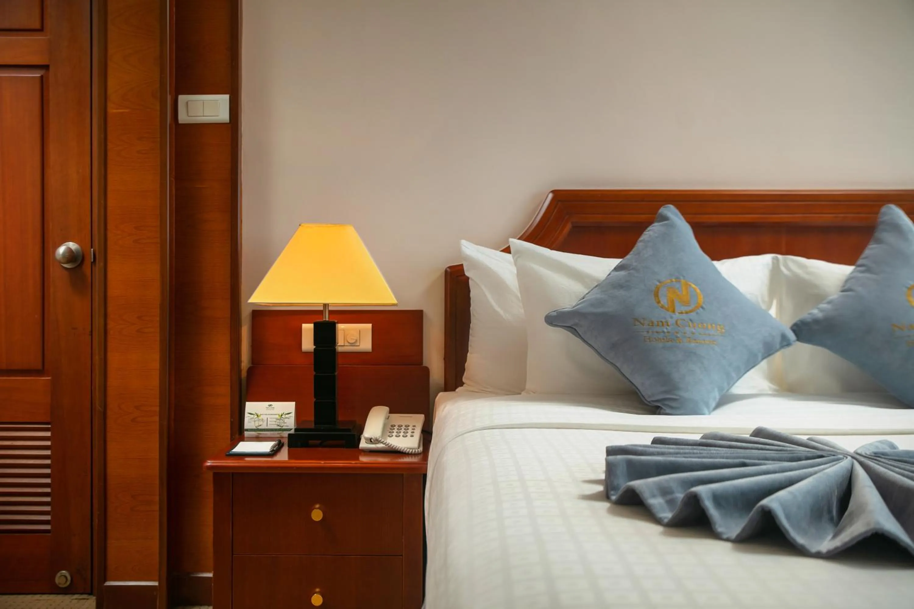 Bed in Nam Cuong Hai Duong Hotel