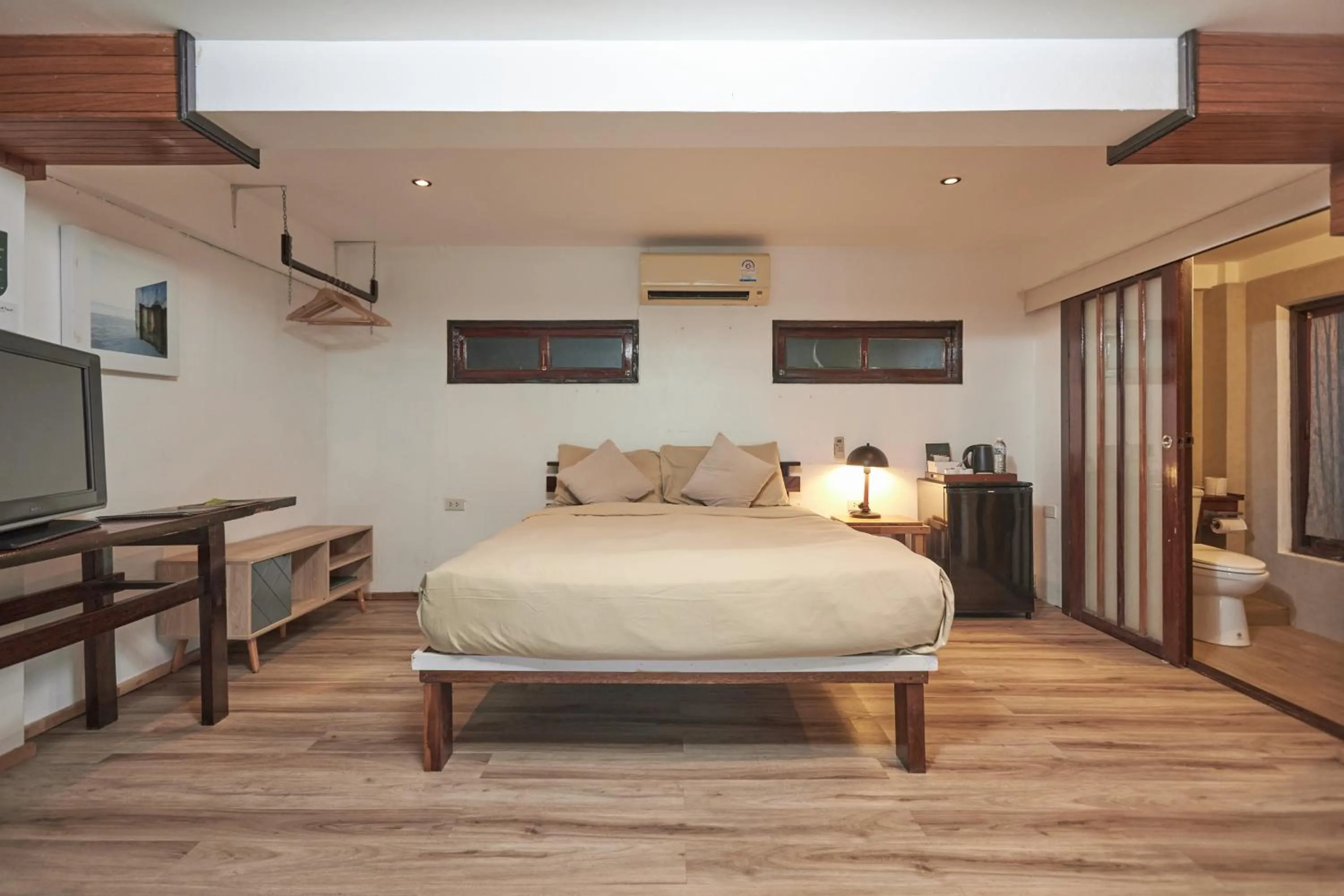 Toilet, Bed in Resolution Resort