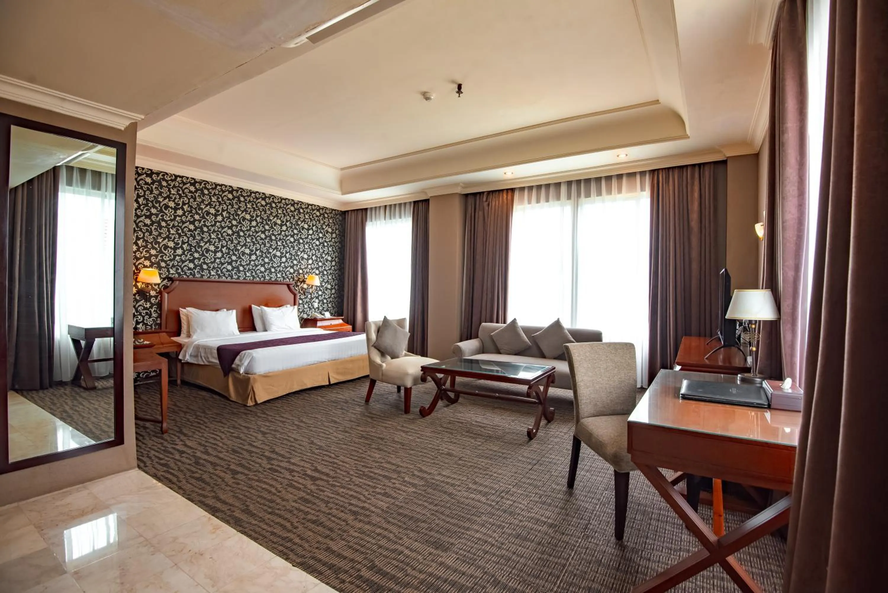 Living room, Bed in The Mirah Hotel Bogor