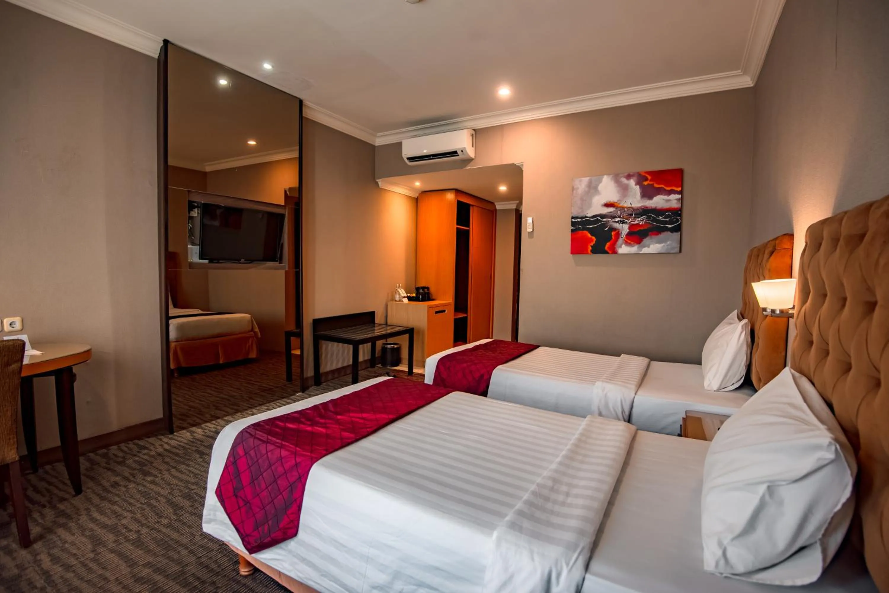 TV and multimedia, Bed in The Mirah Hotel Bogor