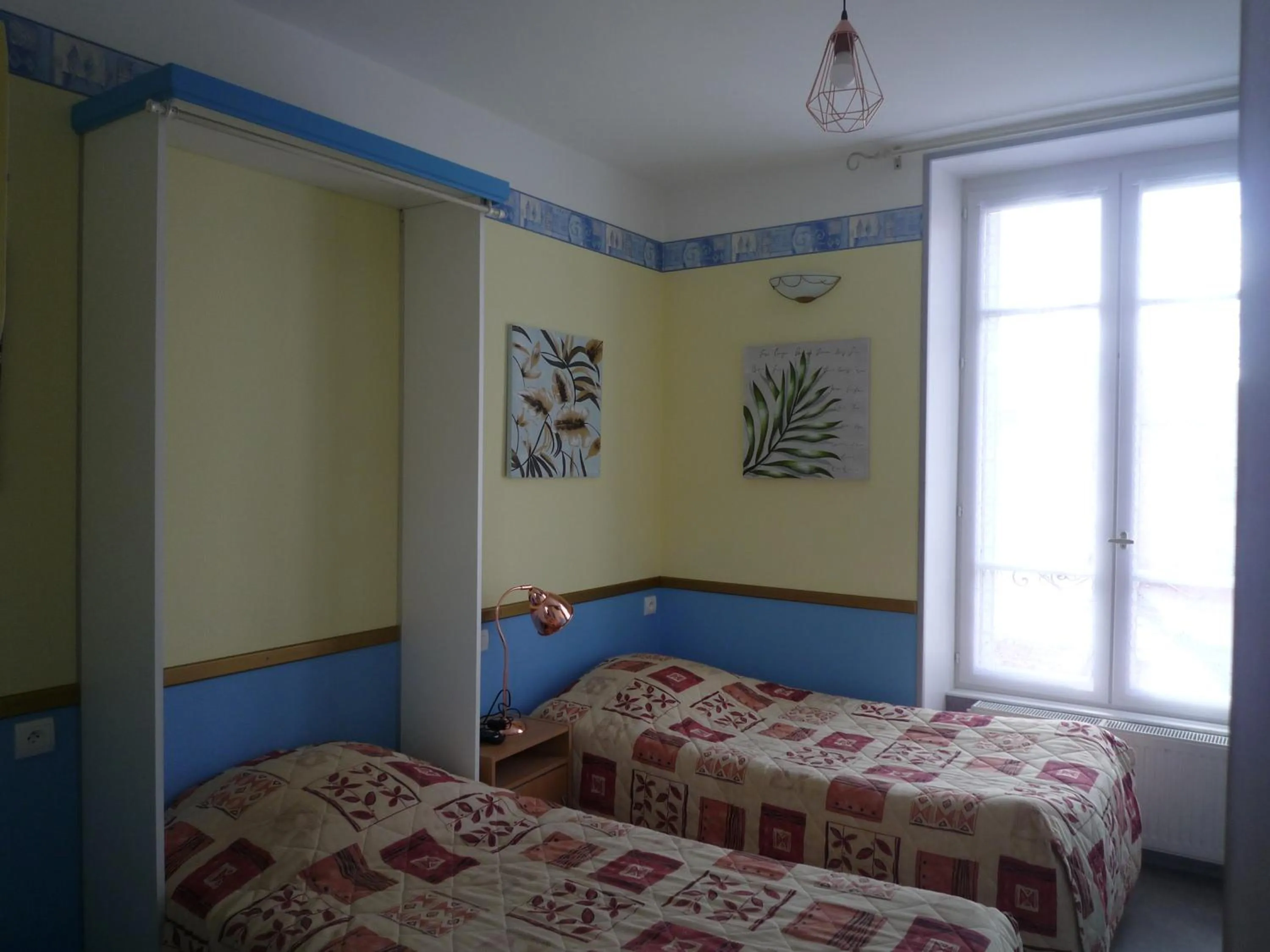 Bed in Au Relais du Parc de Millevaches